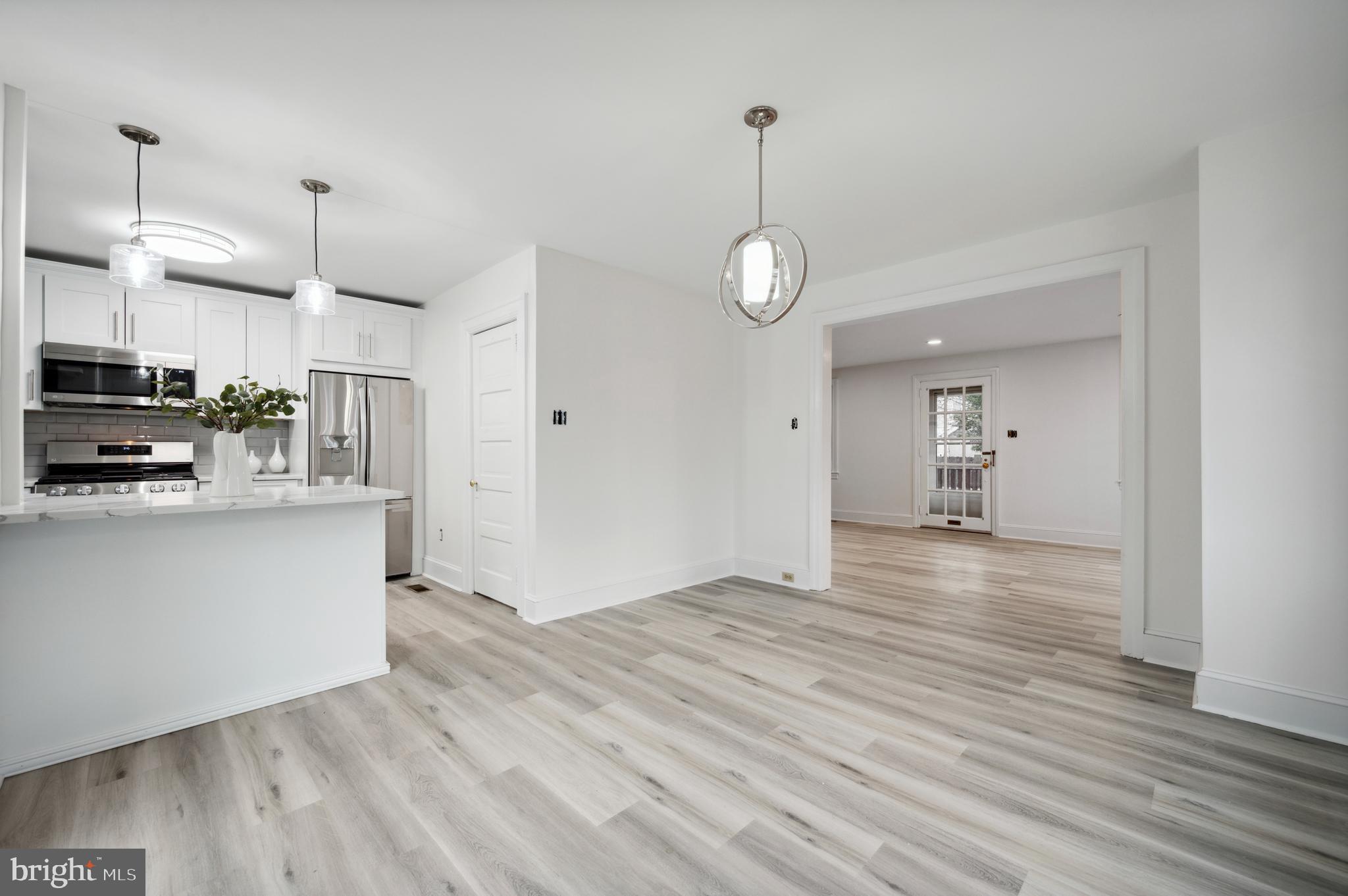156 Edgemont Avenue Ardmore, PA 19003 - Photo 5 of 15 a view of a kitchen with stove and cabinets