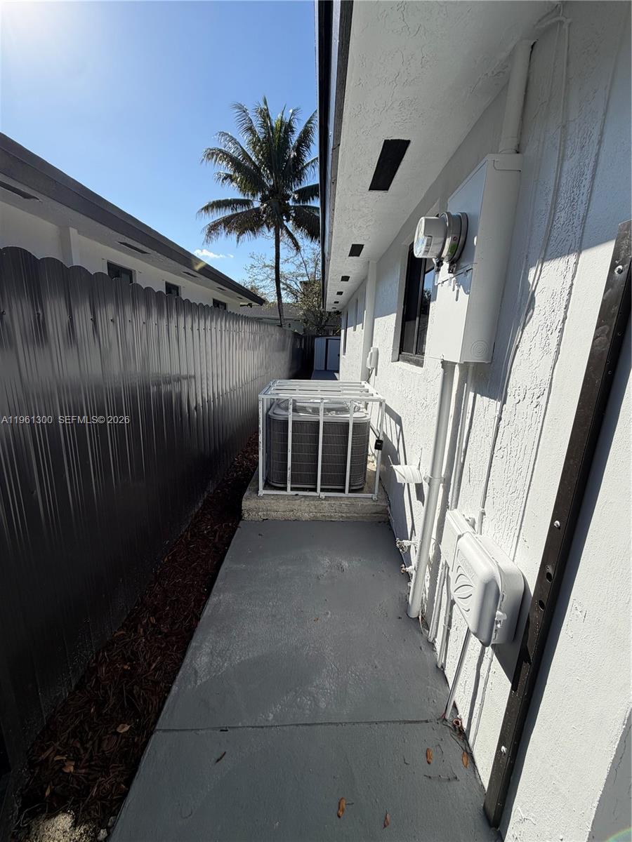 18940 Southwest 113th Court Miami, FL 33157 - Photo 4 of 30 a view of entryway and hall with wooden floor