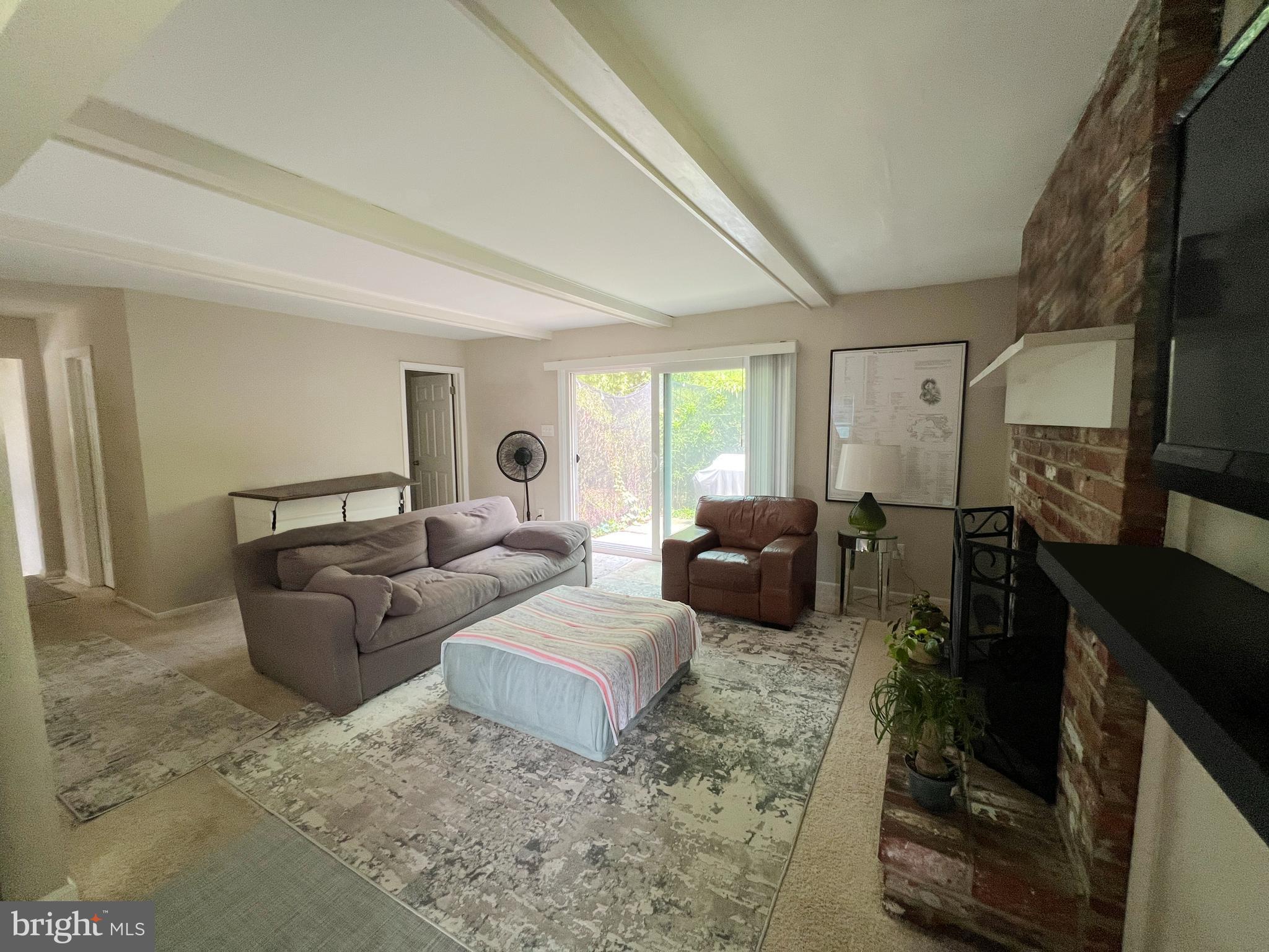 203 Spring Drive Voorhees, NJ 08043 - Photo 11 of 21 a living room with furniture fireplace and flat screen tv