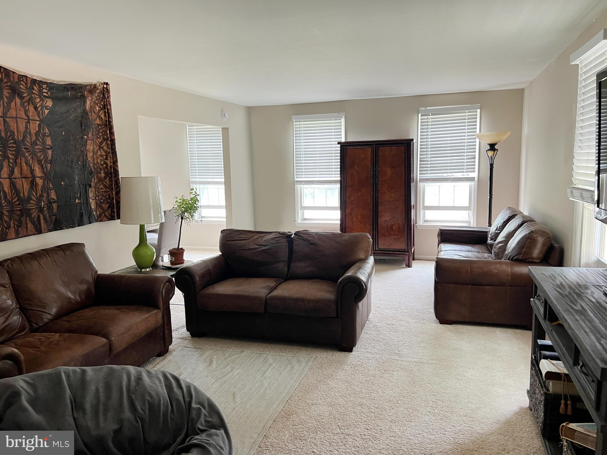 203 Spring Drive Voorhees, NJ 08043 - Photo 4 of 21 a living room with furniture and a window