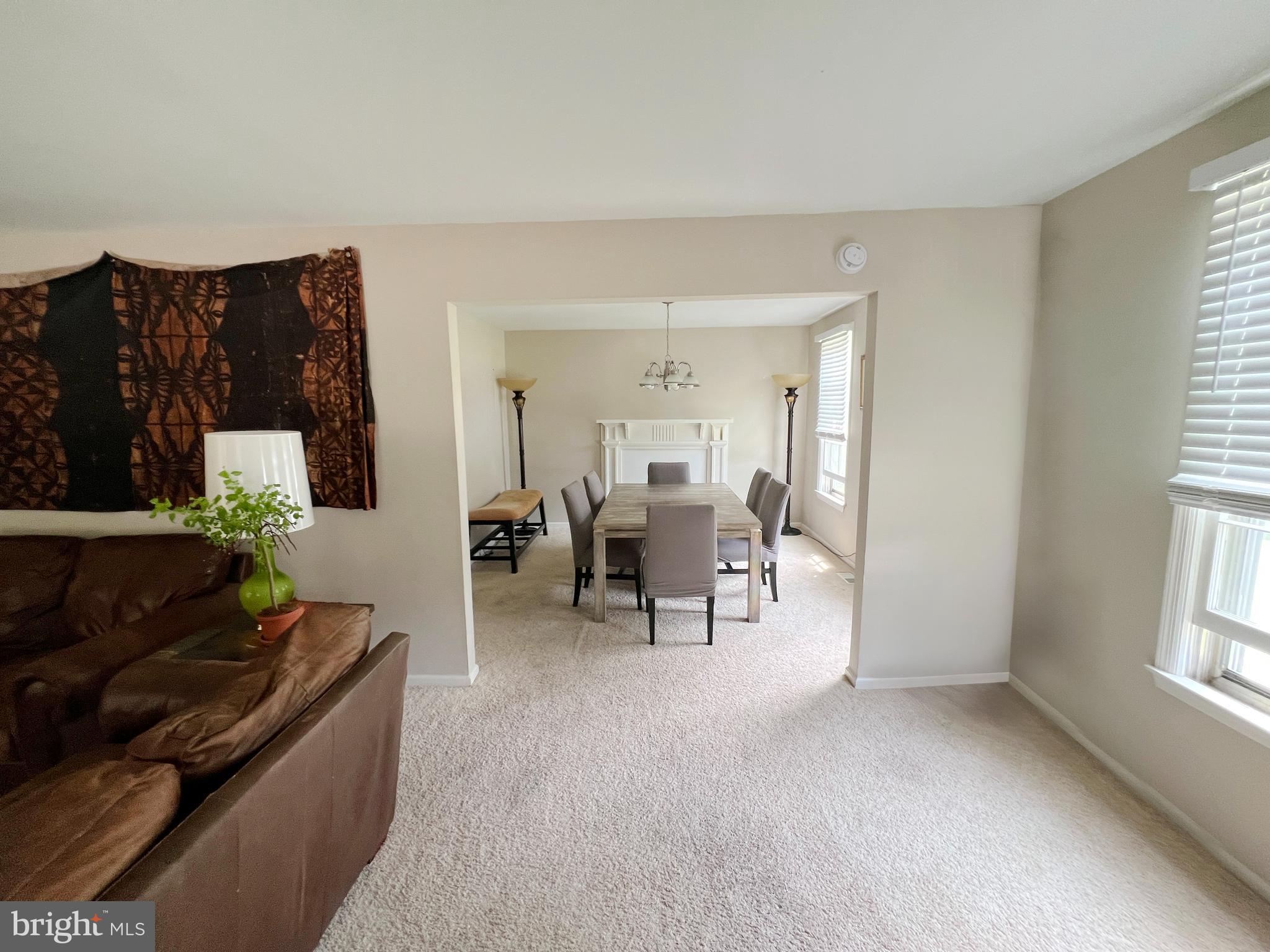 203 Spring Drive Voorhees, NJ 08043 - Photo 6 of 21 a living room with furniture and a window