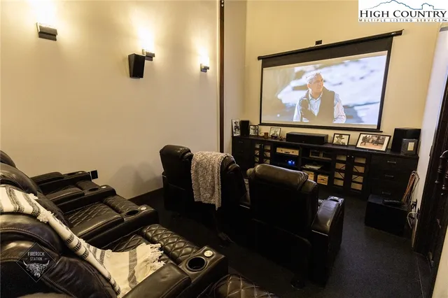 a view of a living room and entryway