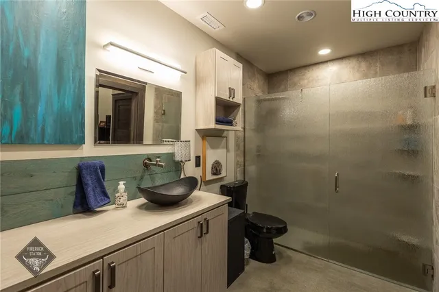 a living room filled with furniture and a couch