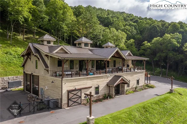 an aerial view of a golf course with parking space