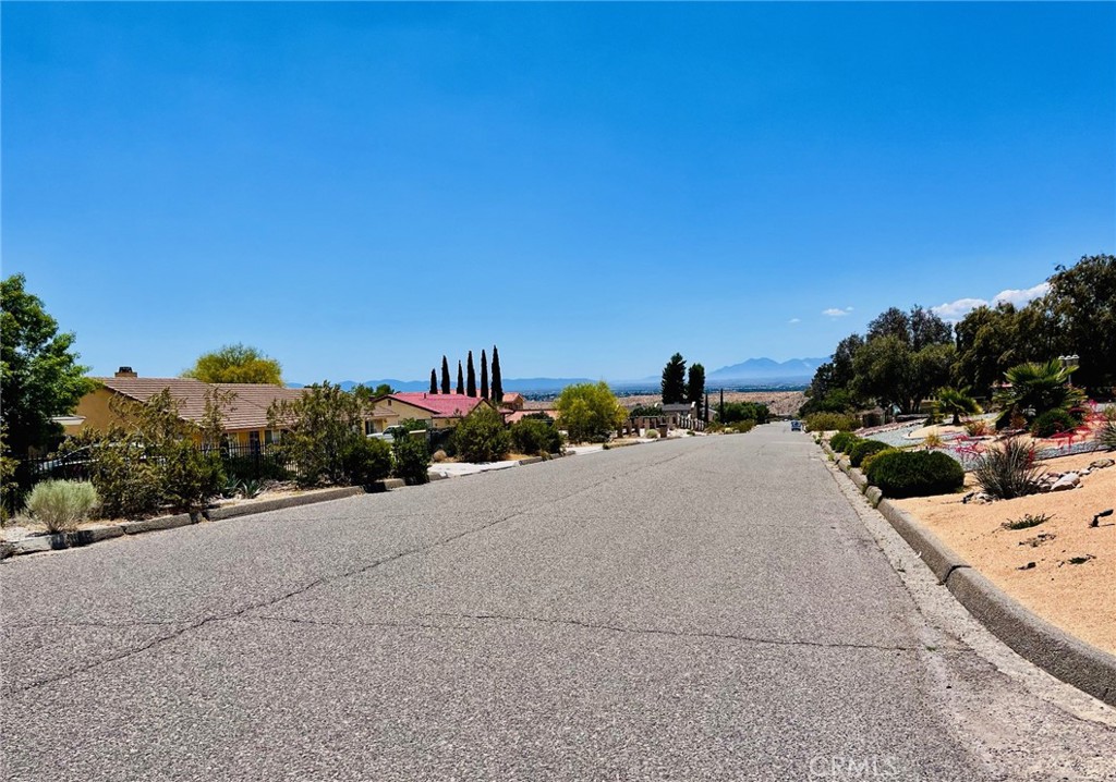 47333203 Muni Road Apple Valley, CA 92307 - Photo 15 of 21 a view of a road with a building in the background