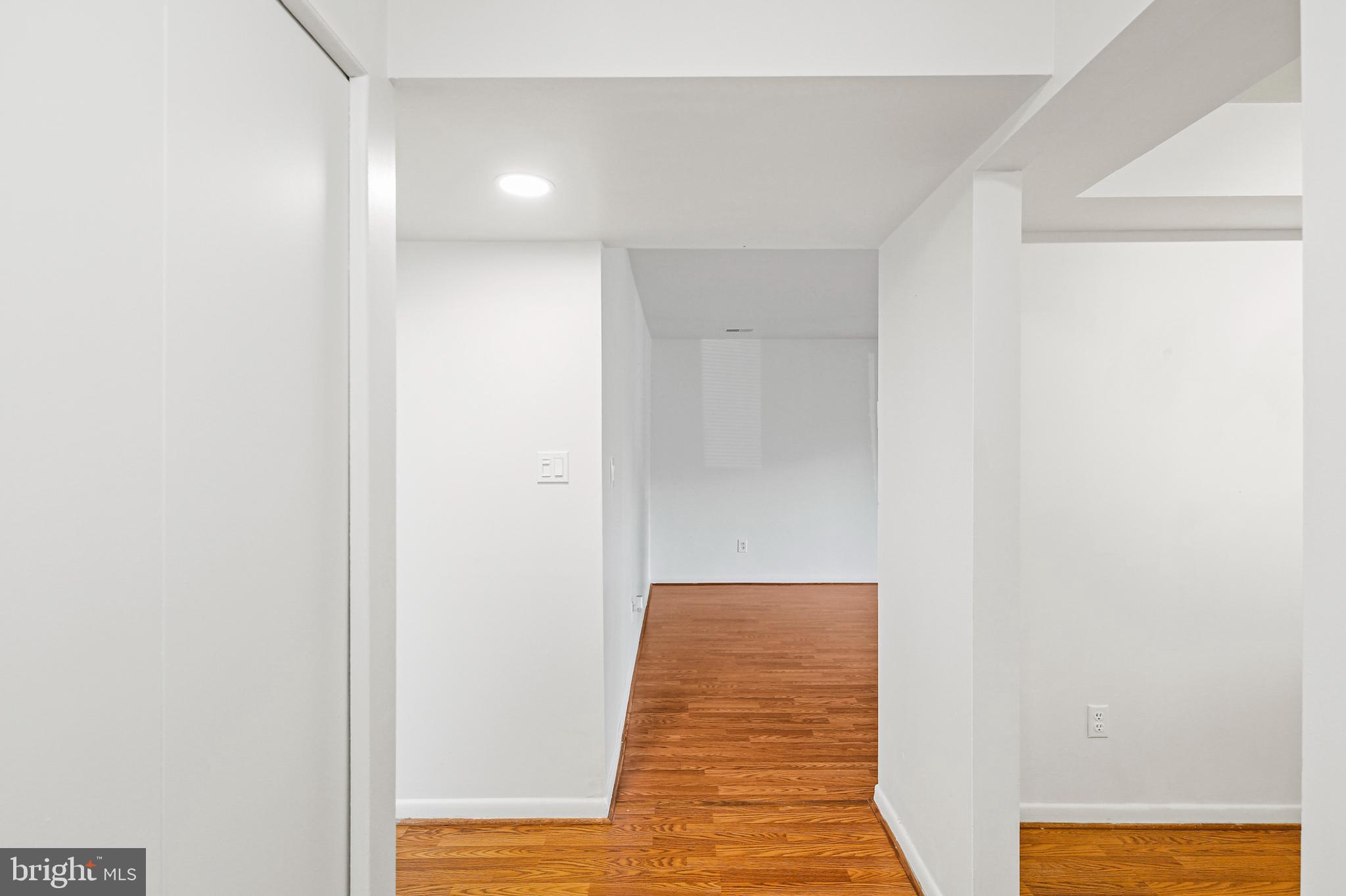 2 Bailiffs Court, Unit 102 Lutherville-Timonium, MD 21093 - Photo 17 of 34 a view of a room with wooden floor