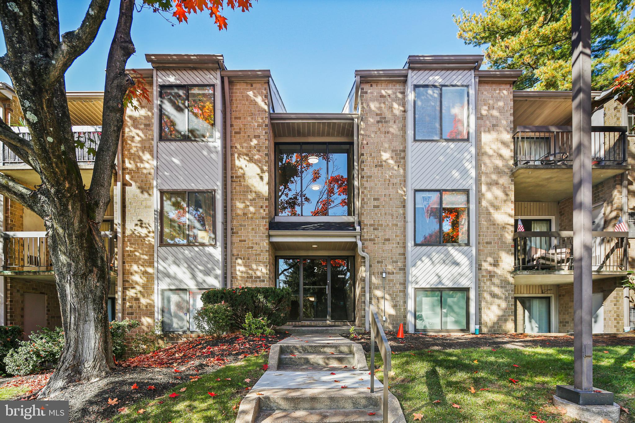 2 Bailiffs Court, Unit 102 Lutherville-Timonium, MD 21093 - Photo 7 of 34 a front view of a multi story building