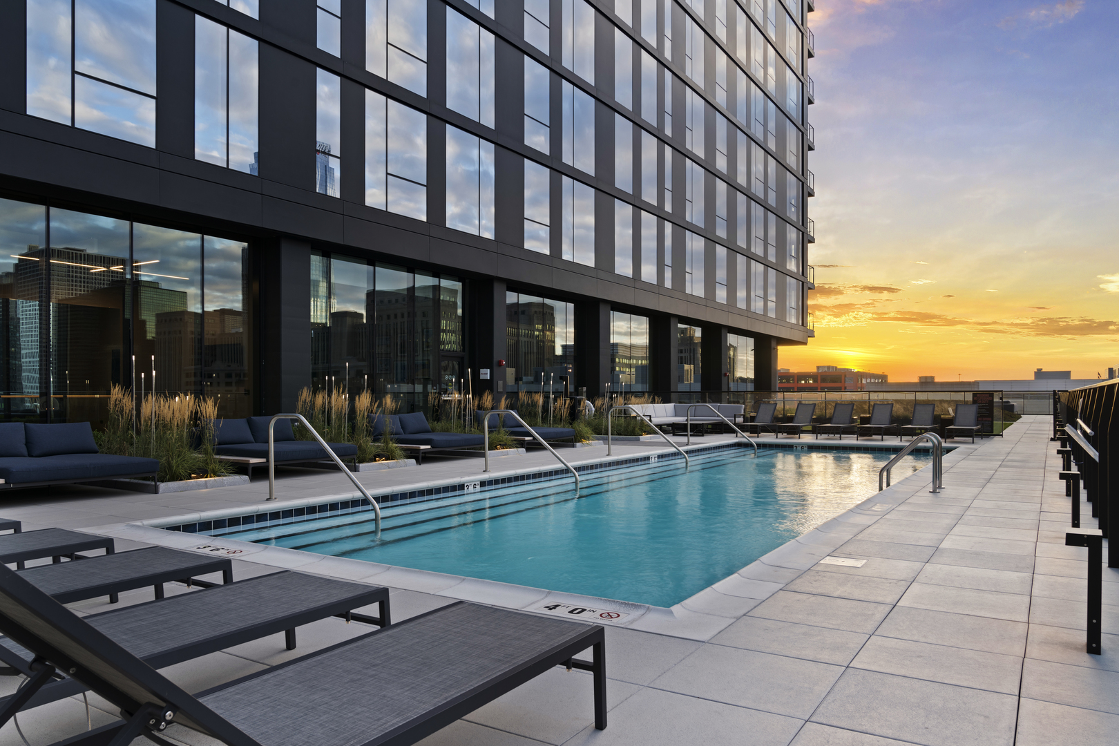 234 West Polk Street, Unit 2402 Chicago, IL 60607 - Photo 36 of 37 a view of a swimming pool with seating area and furniture