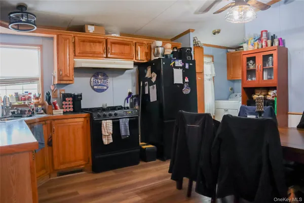 a view of living room and wooden furniture