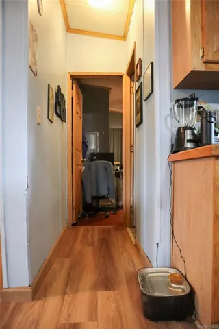 a bedroom with a bed and a chair