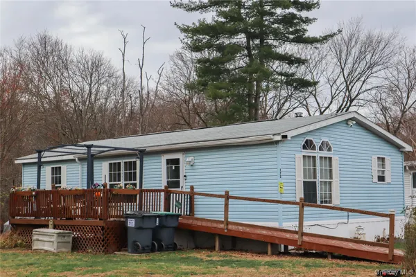 a view of a house with a big yard