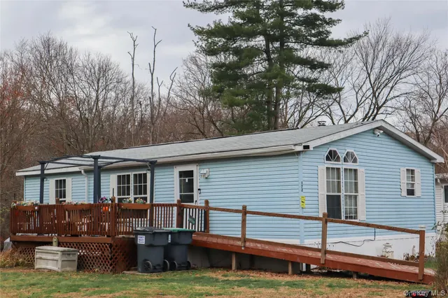 a view of a house with a big yard