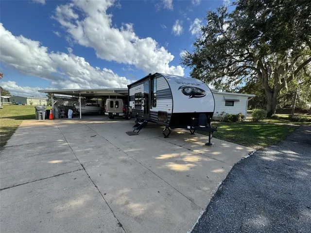 a view of a backyard with garden