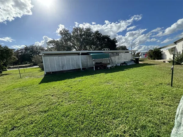a view of a house with a car park