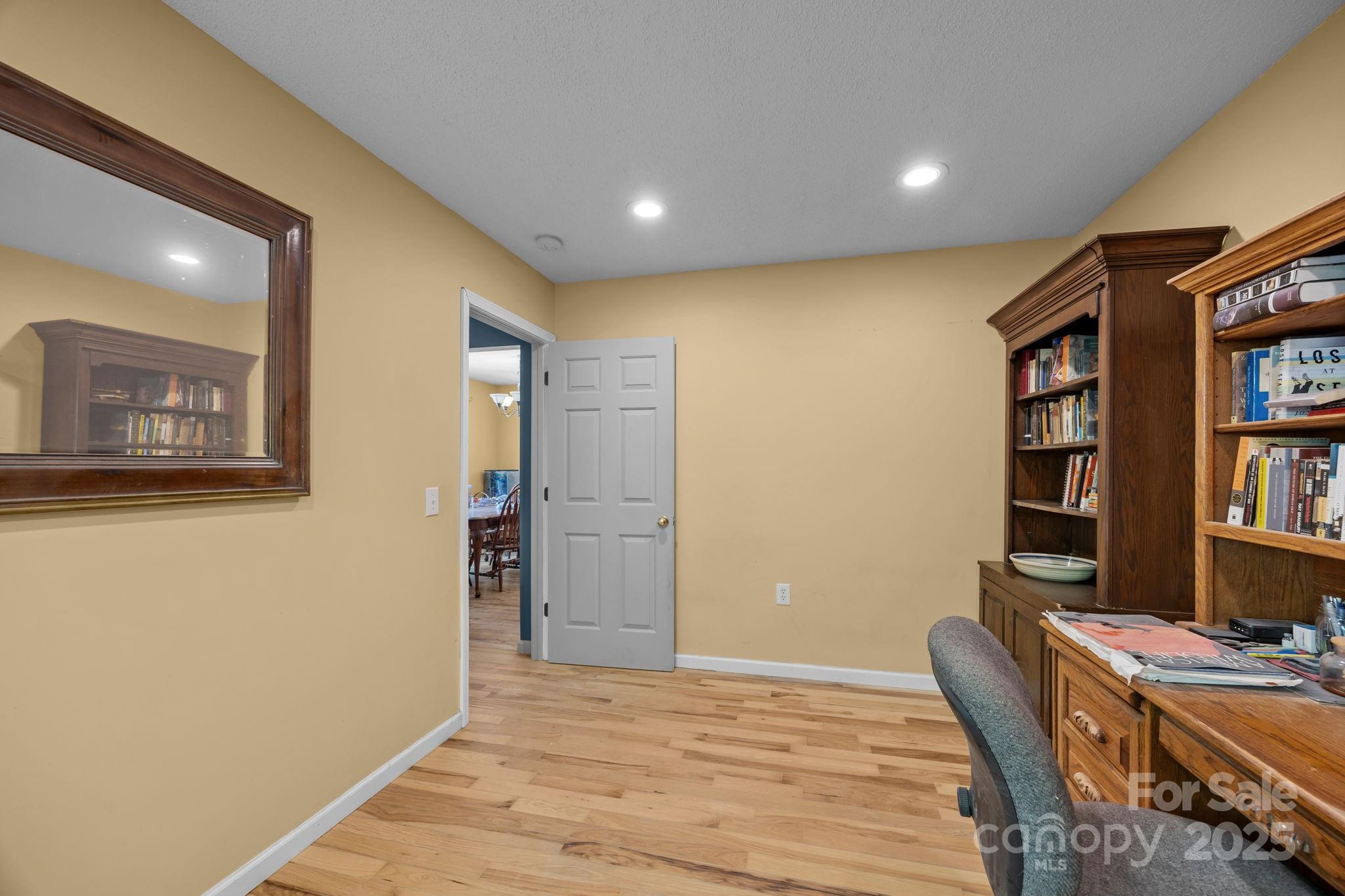 55 Pine Bluff Road Hendersonville, NC 28792 - Photo 20 of 47 a view of a workspace with furniture
