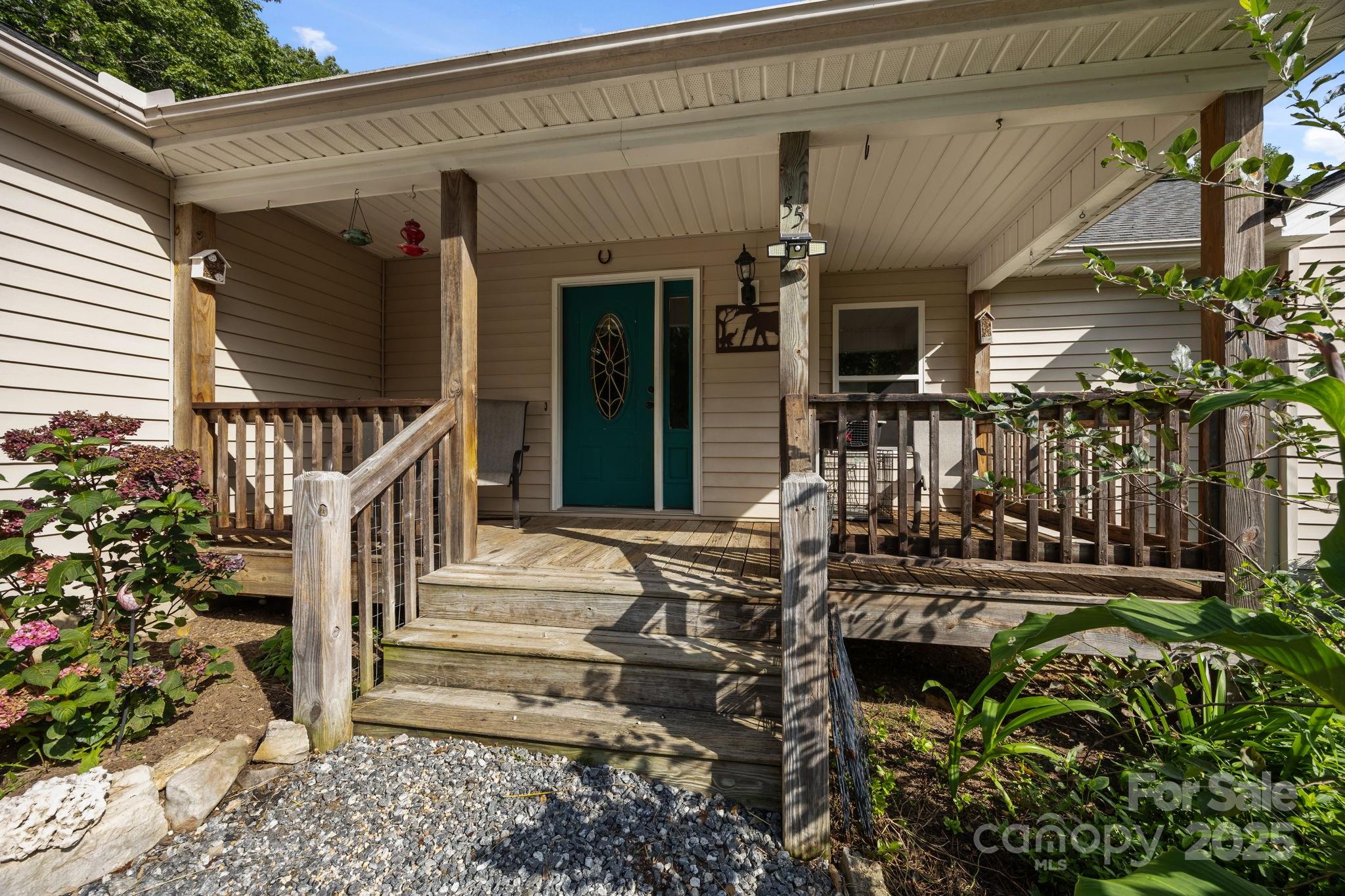 55 Pine Bluff Road Hendersonville, NC 28792 - Photo 2 of 47 a front view of a house with a porch