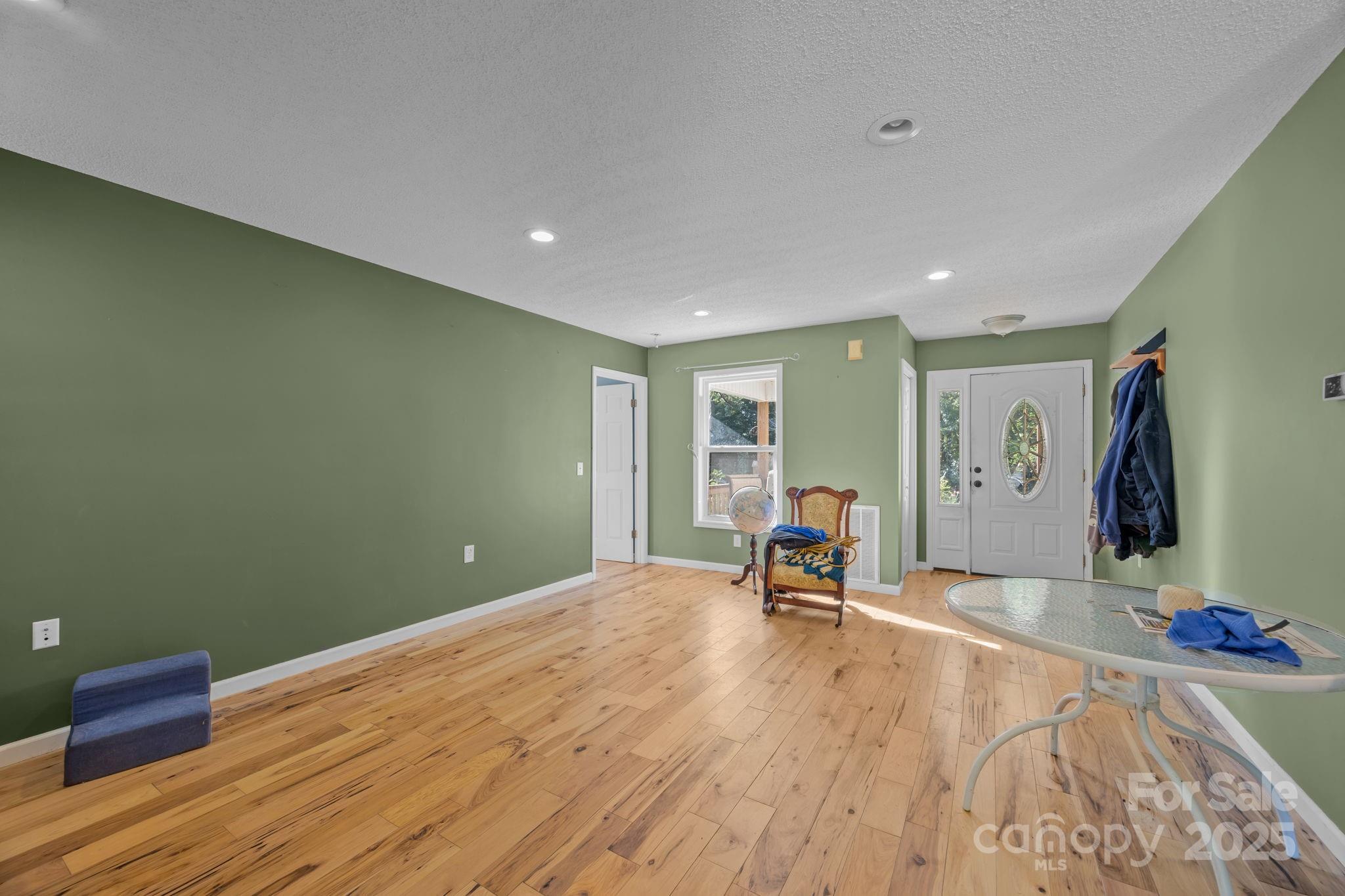 55 Pine Bluff Road Hendersonville, NC 28792 - Photo 3 of 47 a view of a room with gym equipment