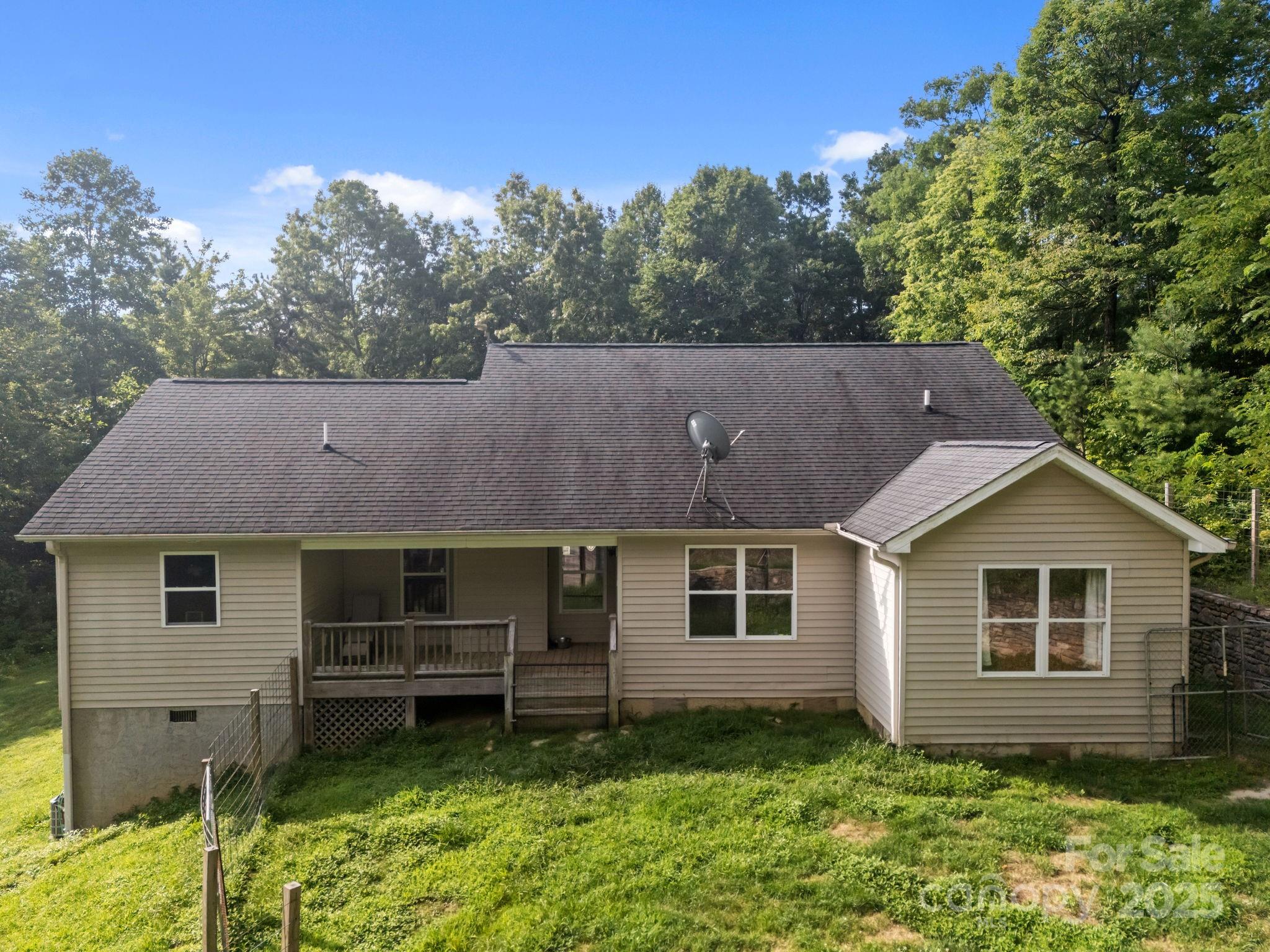 55 Pine Bluff Road Hendersonville, NC 28792 - Photo 34 of 47 a aerial view of a house next to a yard