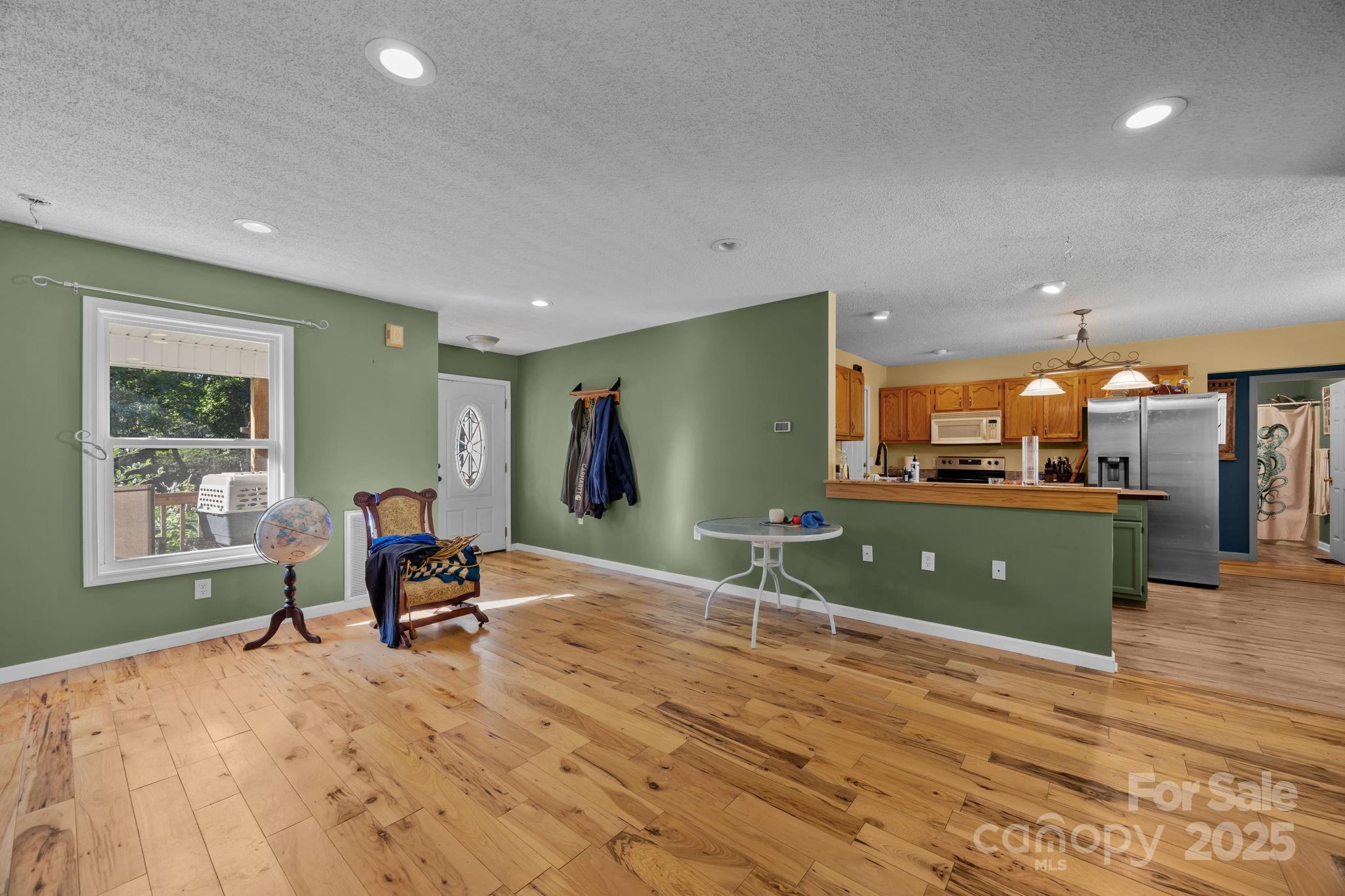 55 Pine Bluff Road Hendersonville, NC 28792 - Photo 4 of 47 a living room with furniture and a window