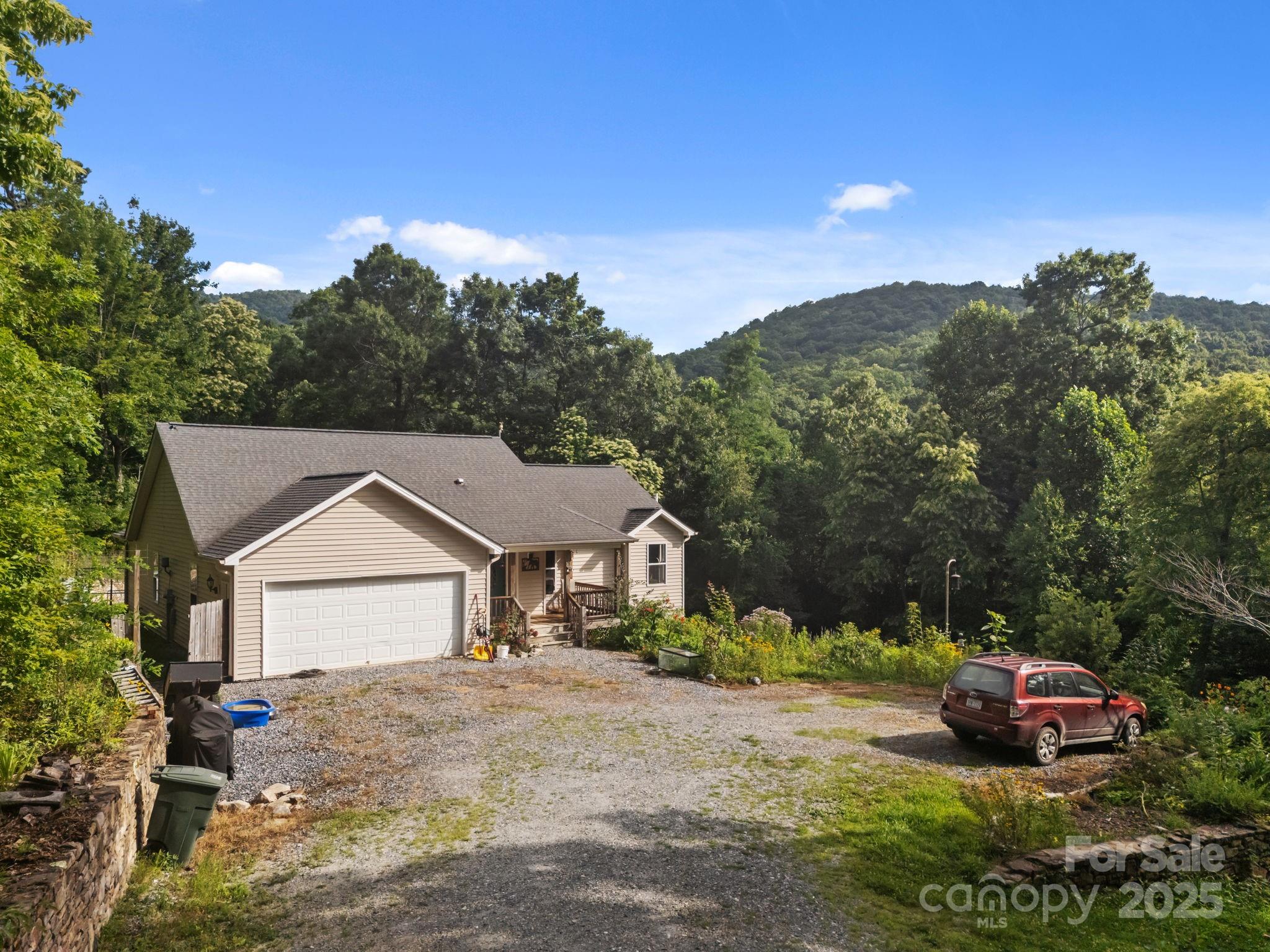 55 Pine Bluff Road Hendersonville, NC 28792 - Photo 47 of 47 a view of house with outdoor space and street view
