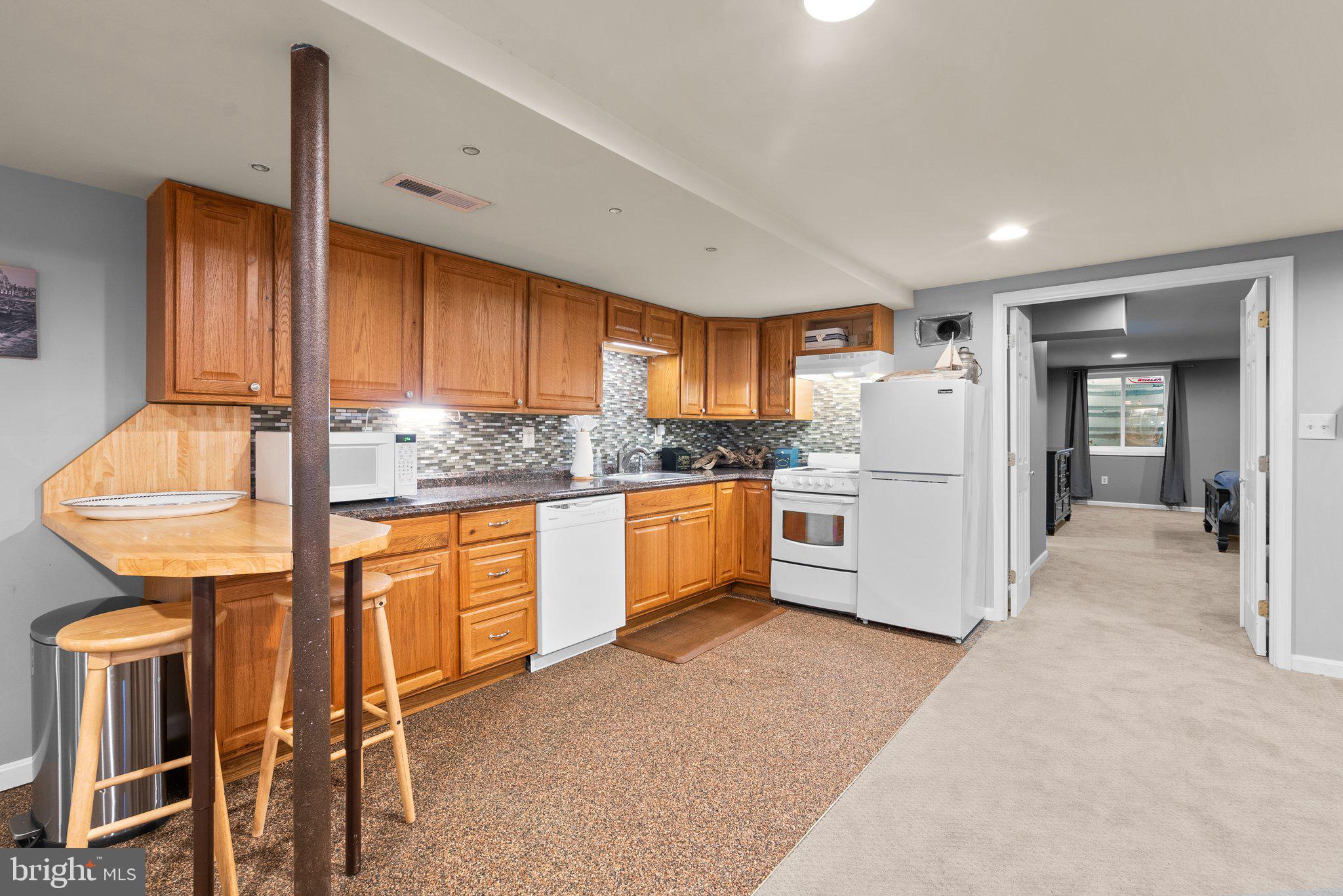 300 Christy Road Pasadena, MD 21122 - Photo 35 of 50 Lower level kitchen