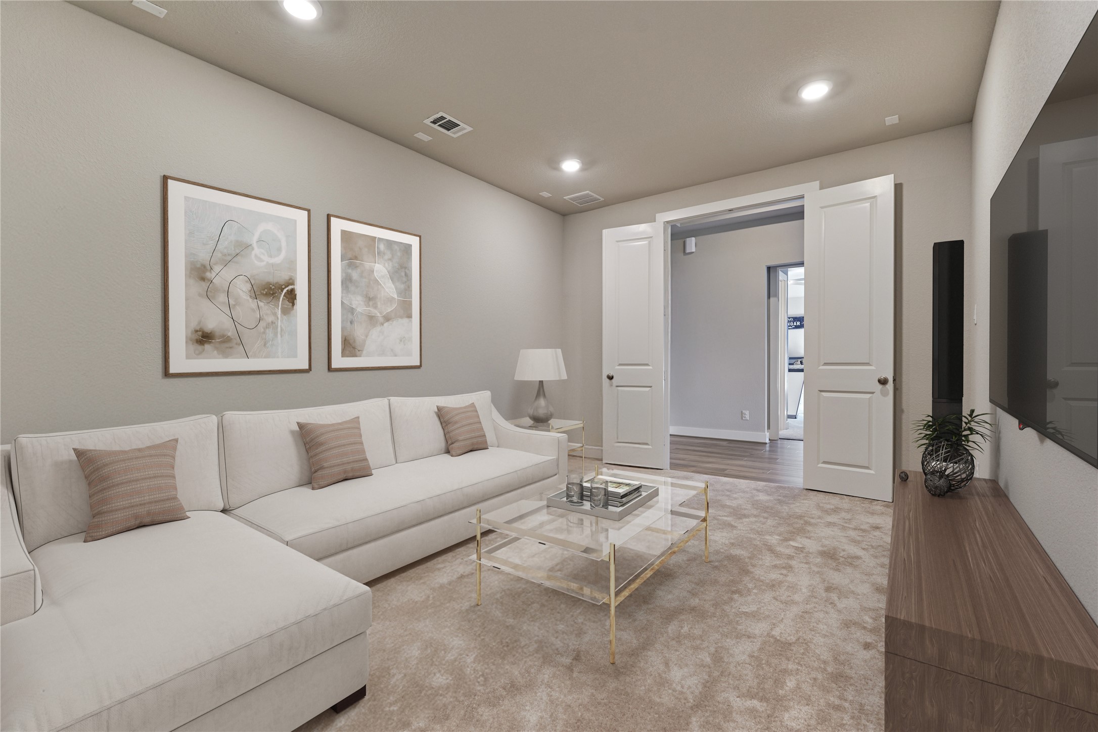 1716 Encino Boulevard Conroe, TX 77304 - Photo 11 of 50 Even further down the entry hall is the media room. This flexible space could be a home gym, a downstairs play room or whatever you desire and need.