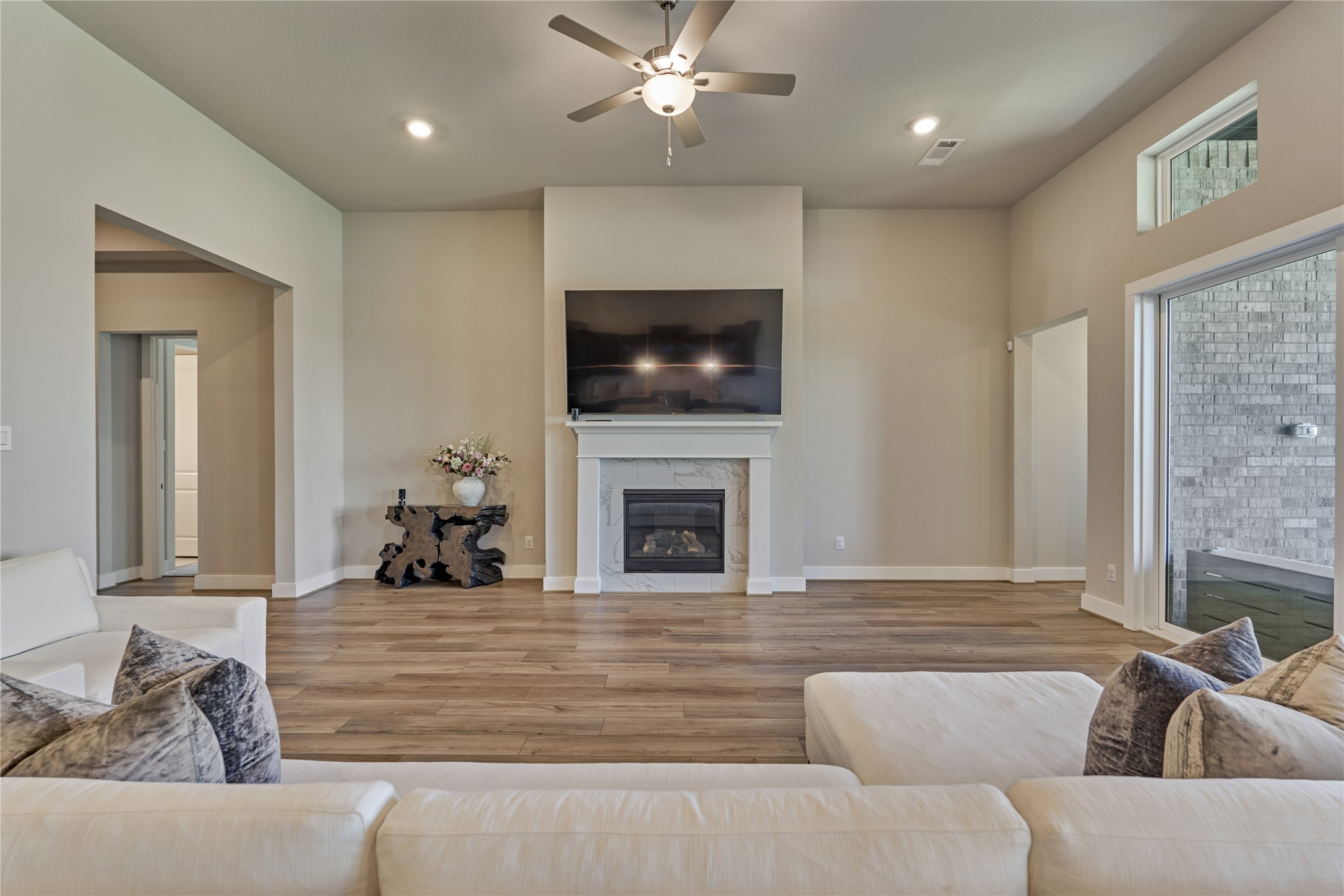 1716 Encino Boulevard Conroe, TX 77304 - Photo 14 of 50 A striking fireplace serves as a centerpiece and creates a warm and cozy ambiance.