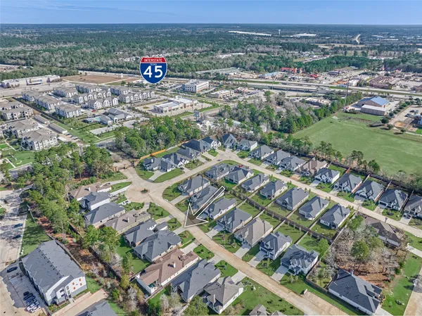 an aerial view of a city with lots of residential buildings