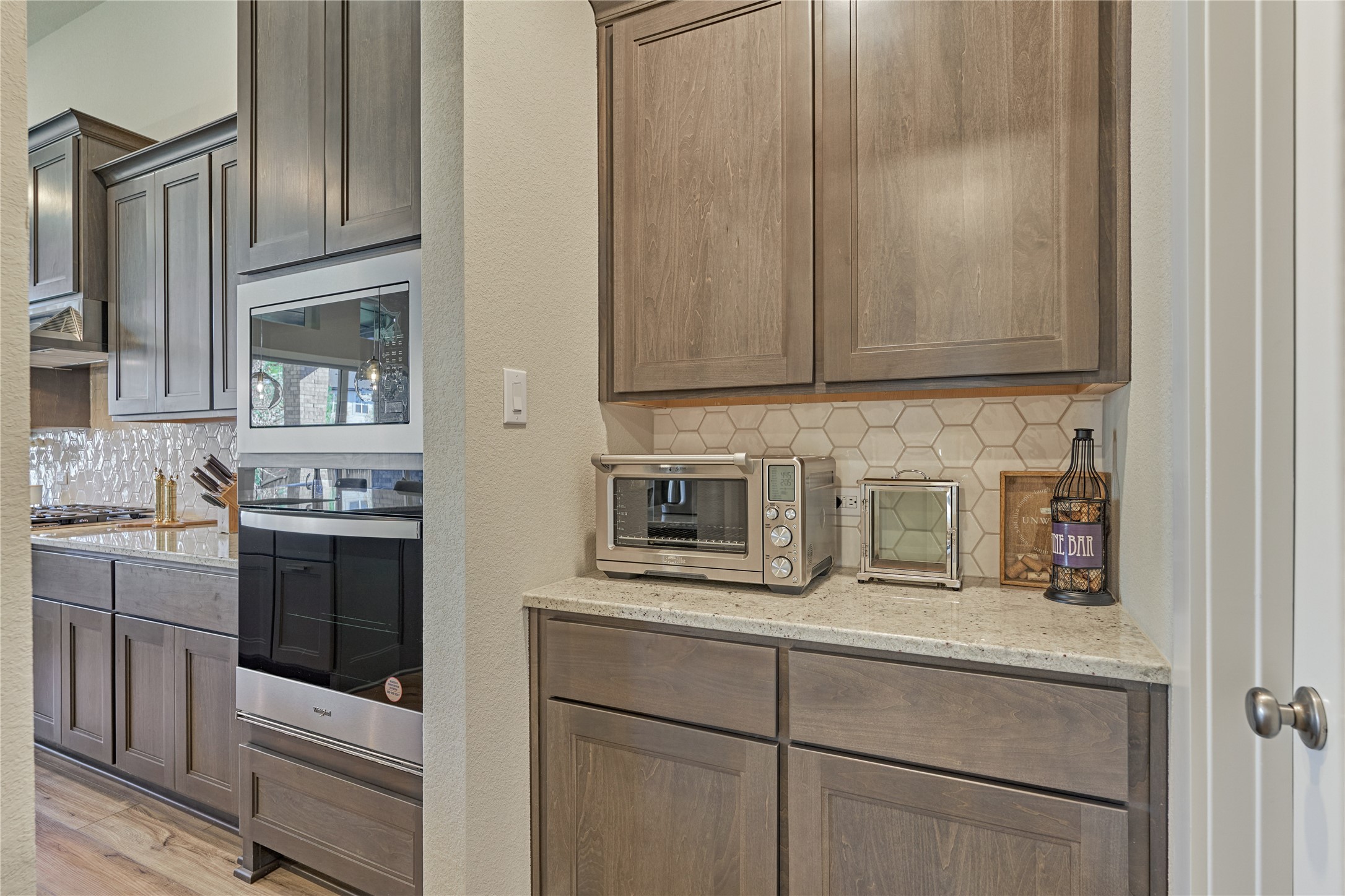 1716 Encino Boulevard Conroe, TX 77304 - Photo 21 of 50 A butler pantry conveniently off the kitchen.