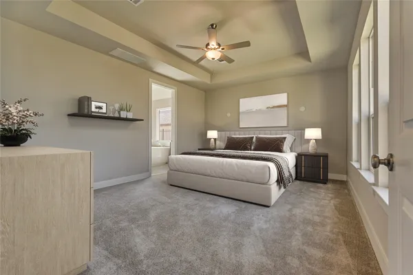 a bedroom with a bed and a couch