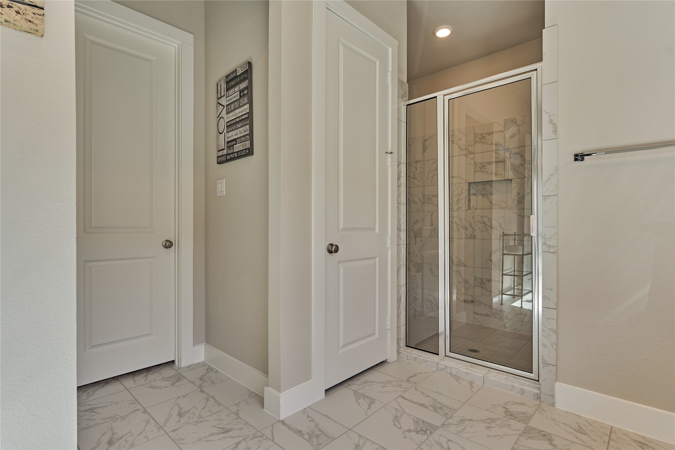 1716 Encino Boulevard Conroe, TX 77304 - Photo 28 of 50 The walk-in shower provides ample space to revive and refresh.