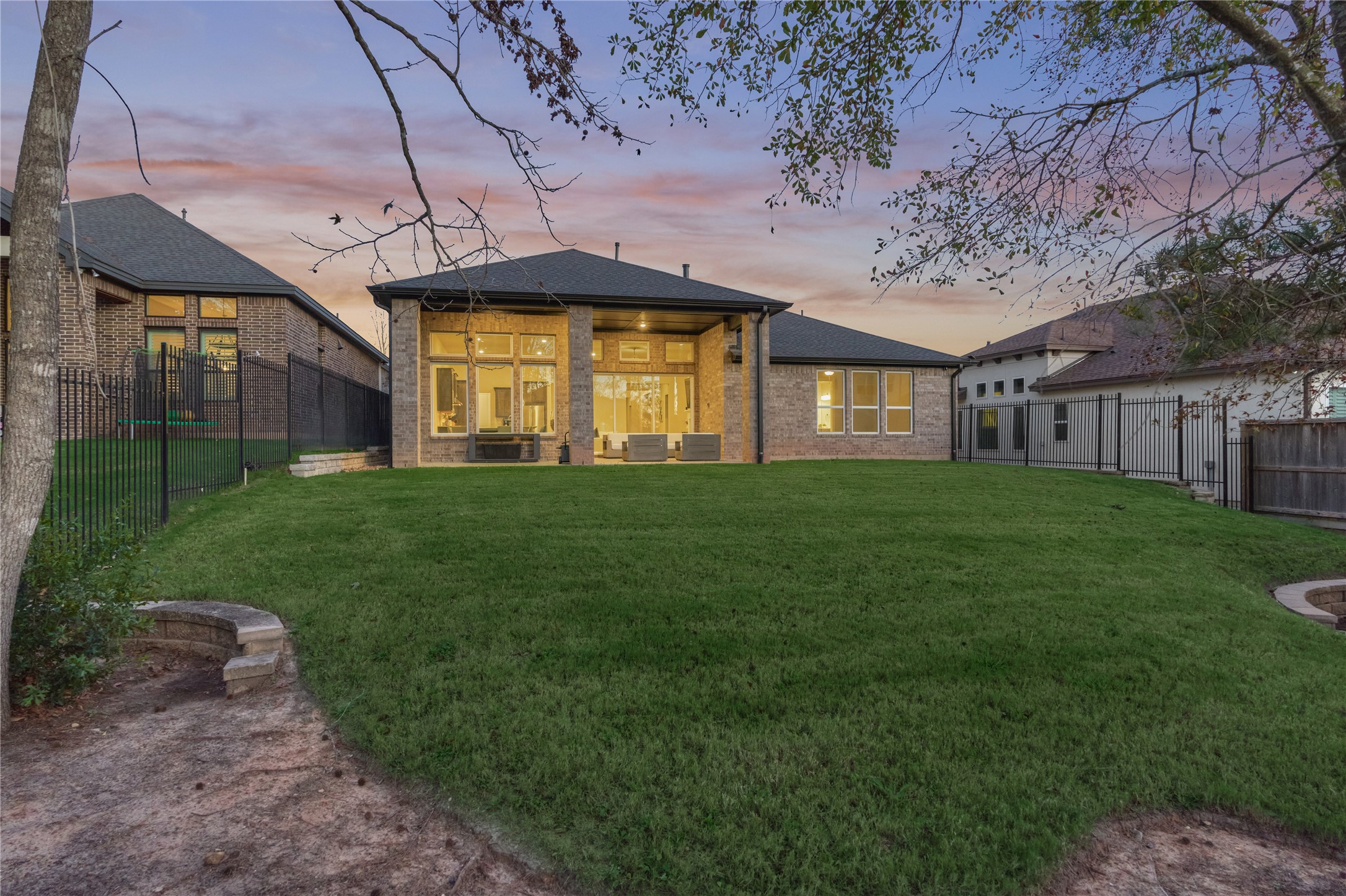 1716 Encino Boulevard Conroe, TX 77304 - Photo 43 of 50 A generously sized back yard offers endless potential for your personal touches.