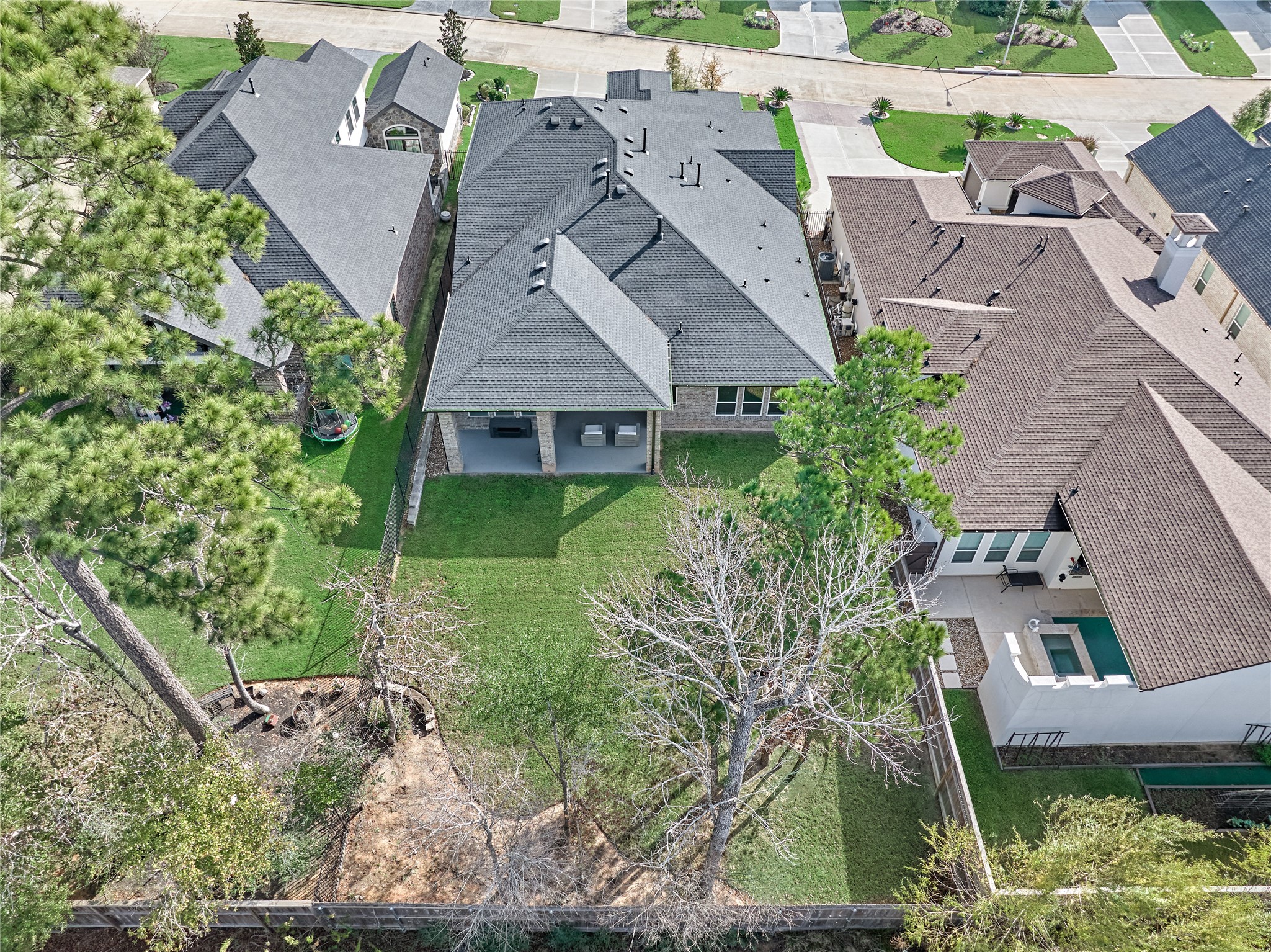 1716 Encino Boulevard Conroe, TX 77304 - Photo 46 of 50 So much space to entertain in the huge back yard!