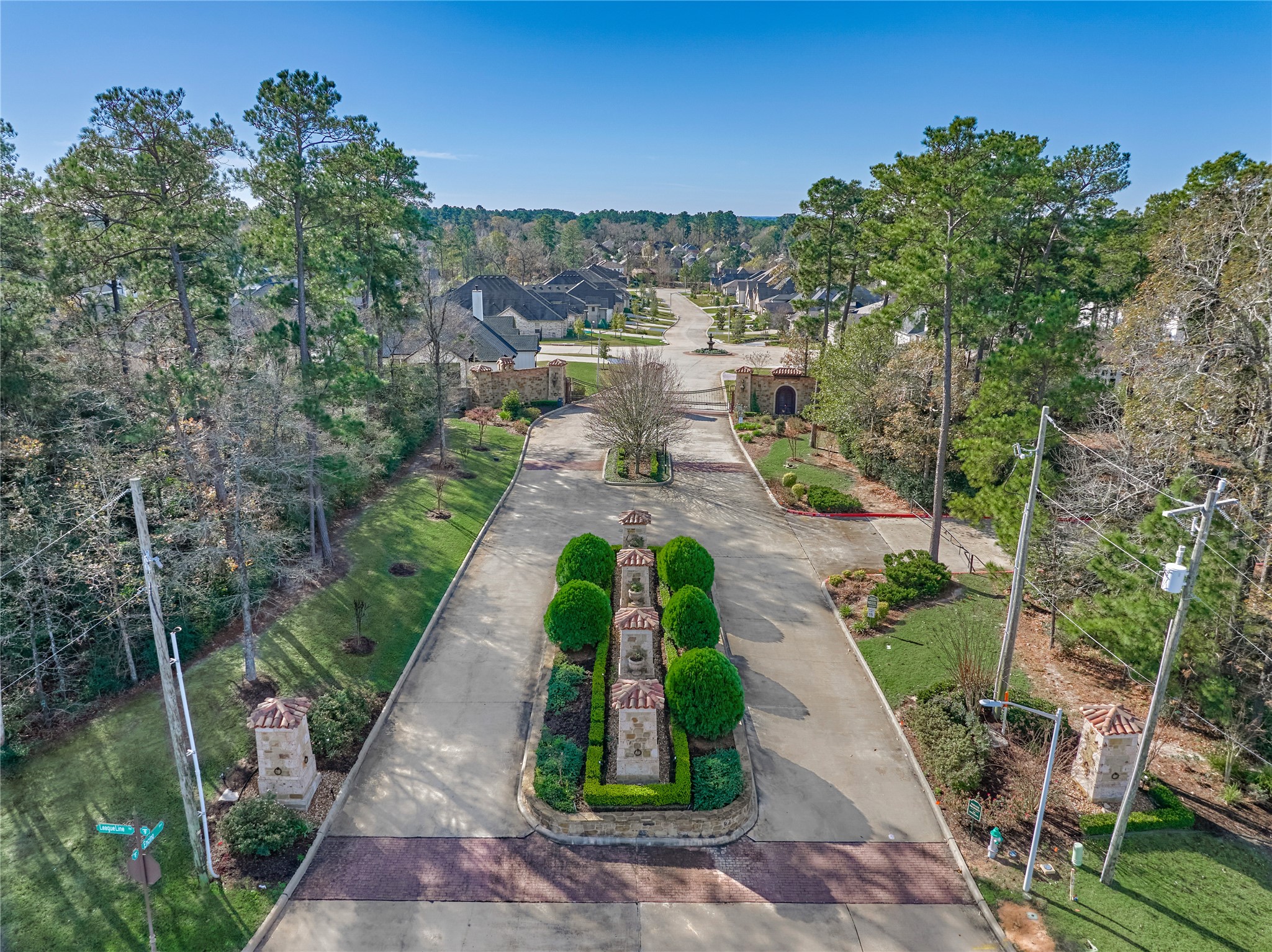 1716 Encino Boulevard Conroe, TX 77304 - Photo 48 of 50 The beautiful gated entrance into this lovely neighborhood.