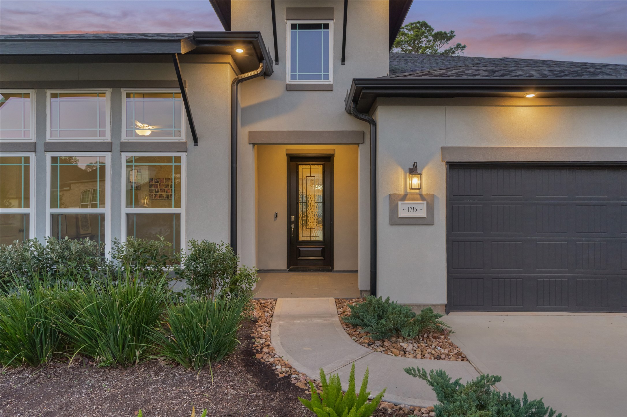 1716 Encino Boulevard Conroe, TX 77304 - Photo 5 of 50 This home features a versatile 3-car tandem garage, offering plenty of room for vehicles plus a deep tandem bay, perfect for a 3rd vehicle, workshop, lawn equipment or simply just for storage.
