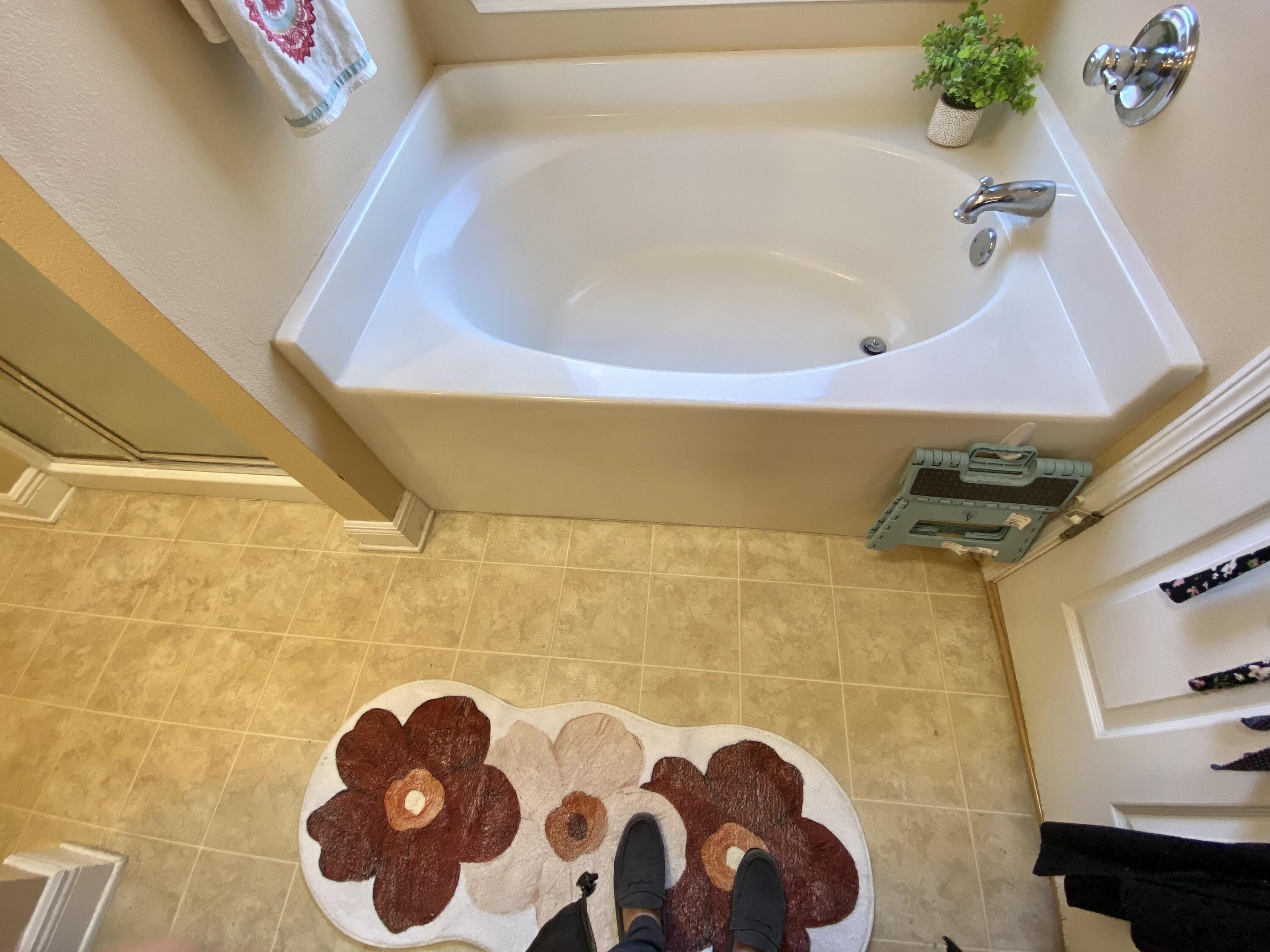 402 Wych Circle Crestview, FL 32536 - Photo 31 of 48 a bathroom with a bathtub and a shower