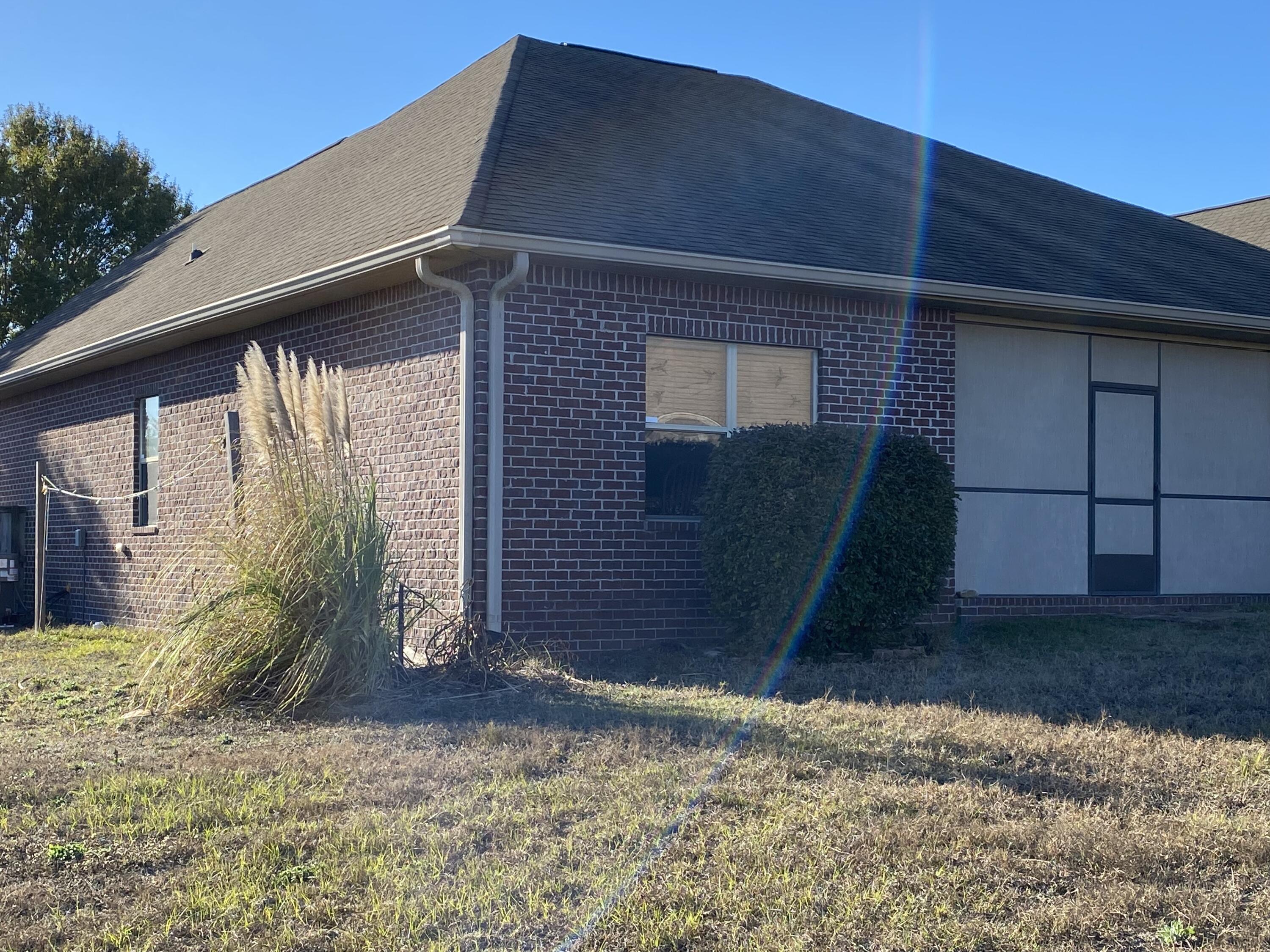 402 Wych Circle Crestview, FL 32536 - Photo 41 of 48 a front view of a house with a yard