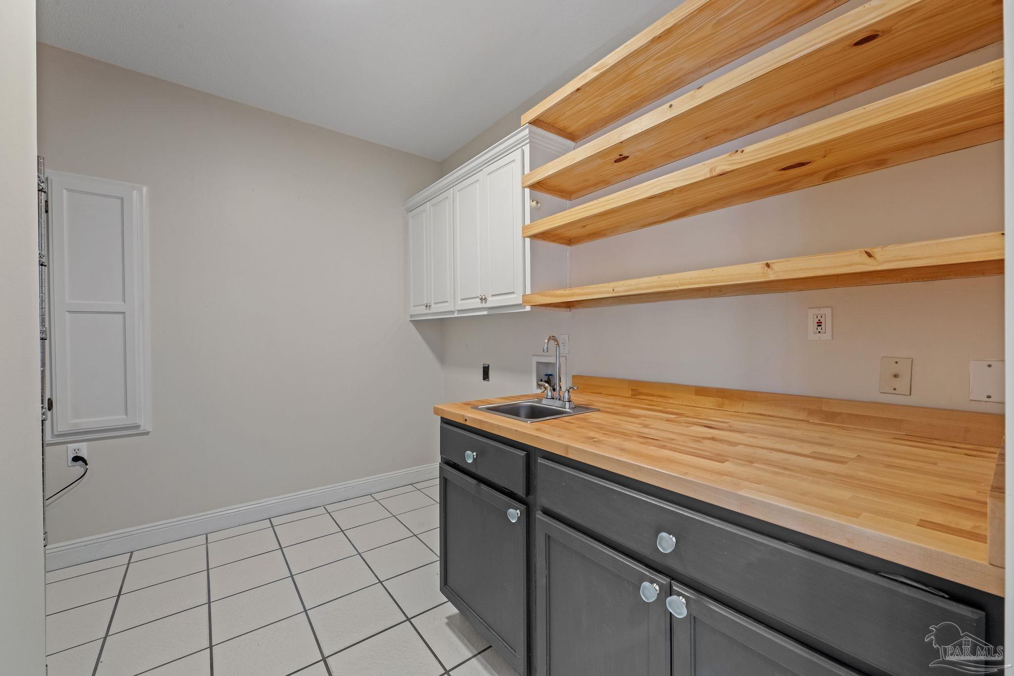 4149 Chartwell Street Pace, FL 32571 - Photo 16 of 49 a view of a kitchen counter space
