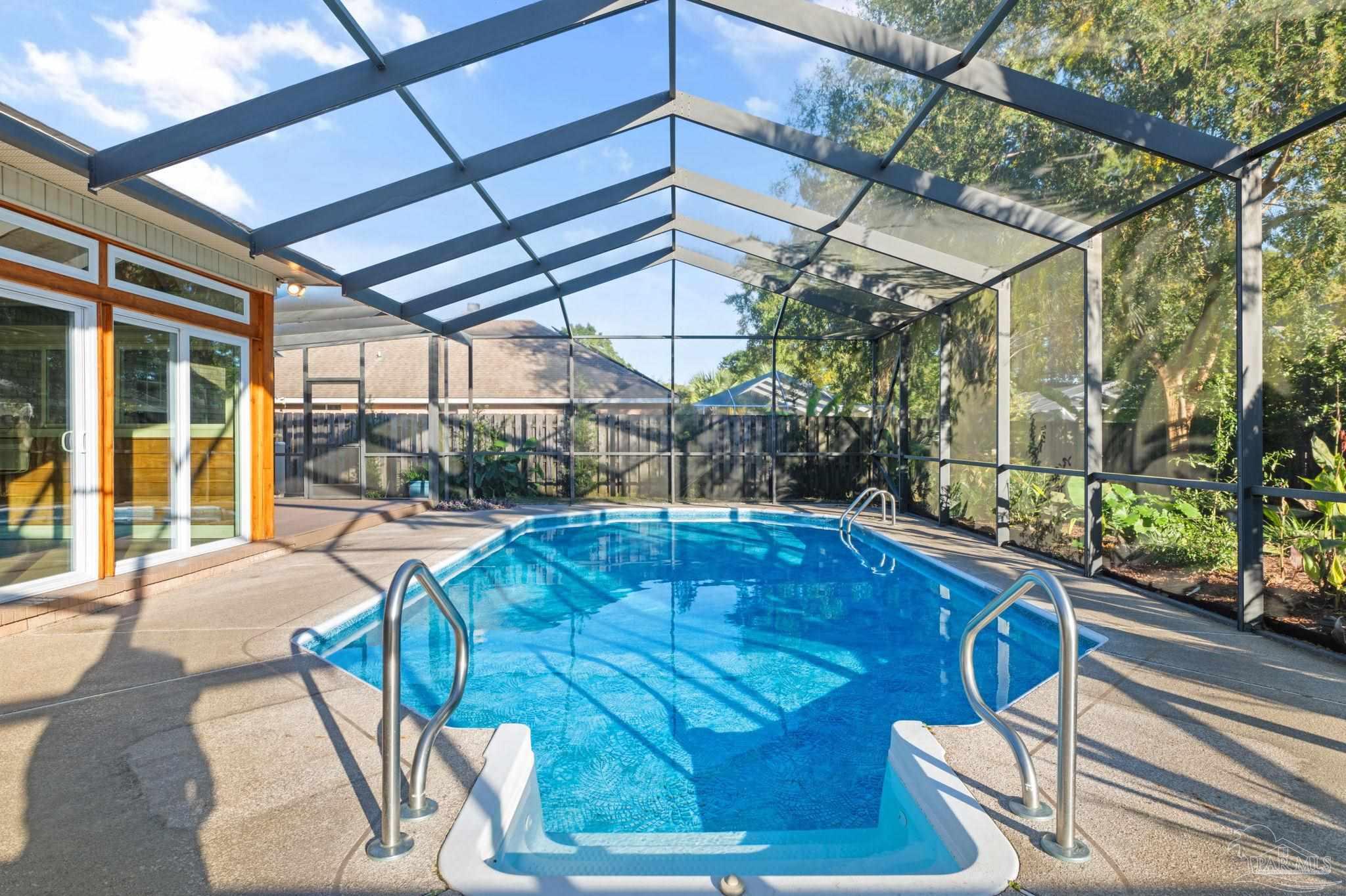 4149 Chartwell Street Pace, FL 32571 - Photo 37 of 49 a view of a backyard with sitting area