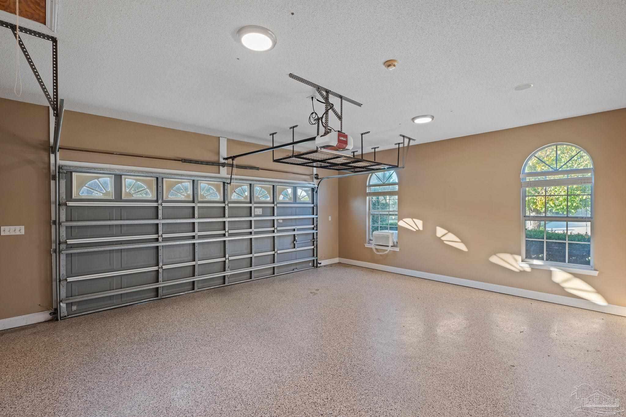 4149 Chartwell Street Pace, FL 32571 - Photo 41 of 49 a view of an empty room with a window