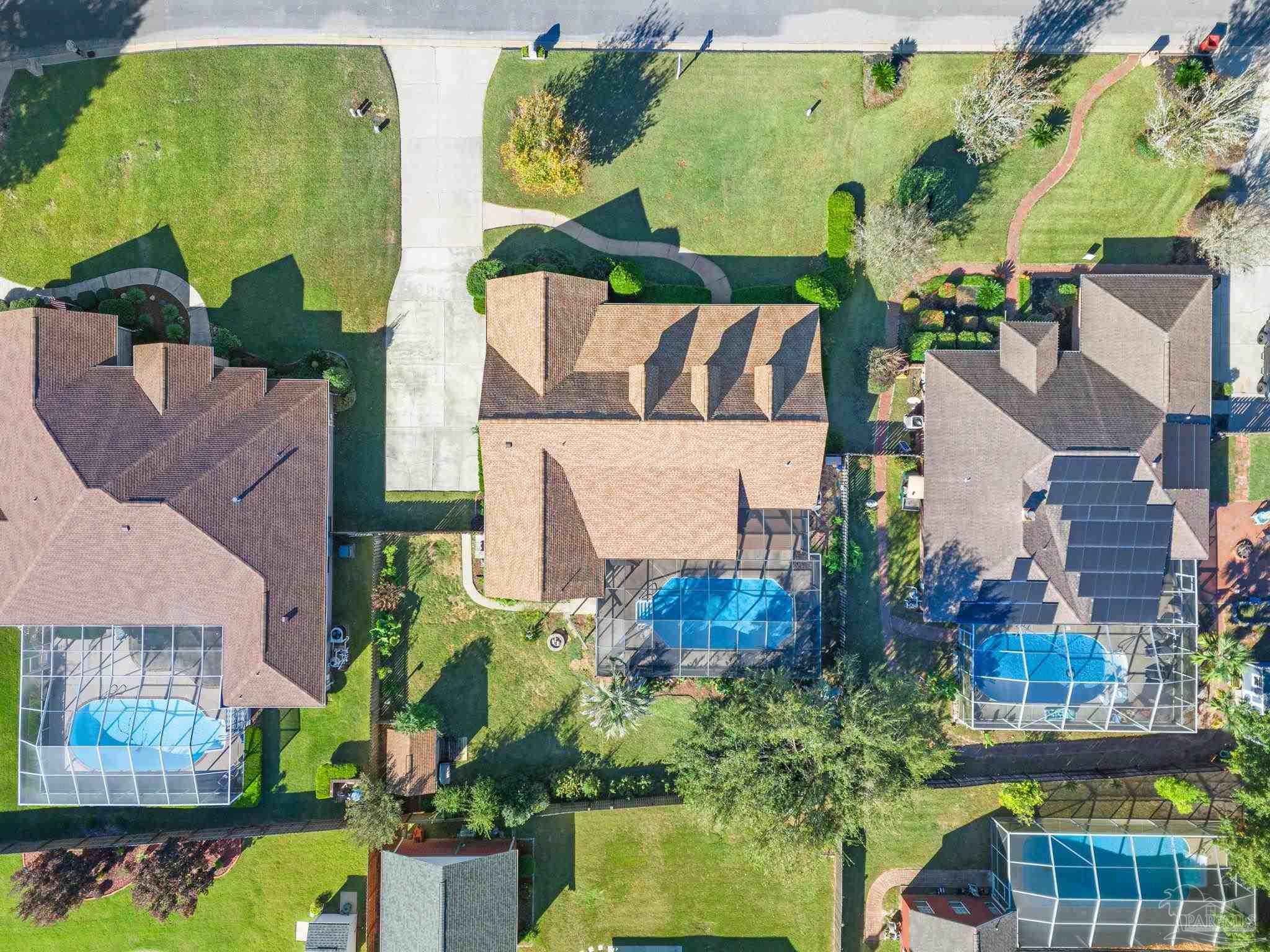 4149 Chartwell Street Pace, FL 32571 - Photo 45 of 49 an aerial view of a house with swimming pool outdoor seating and yard