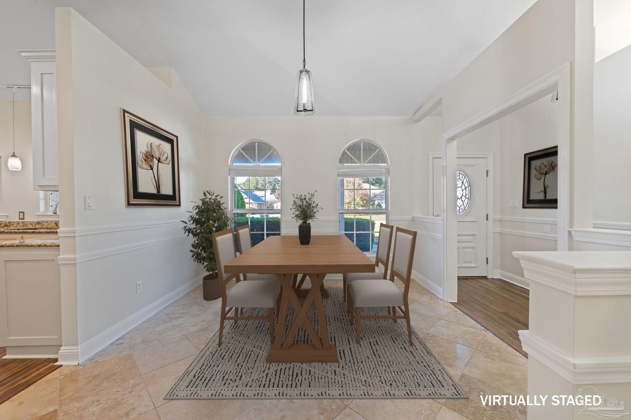 4149 Chartwell Street Pace, FL 32571 - Photo 8 of 49 a dining room with wooden floor and window