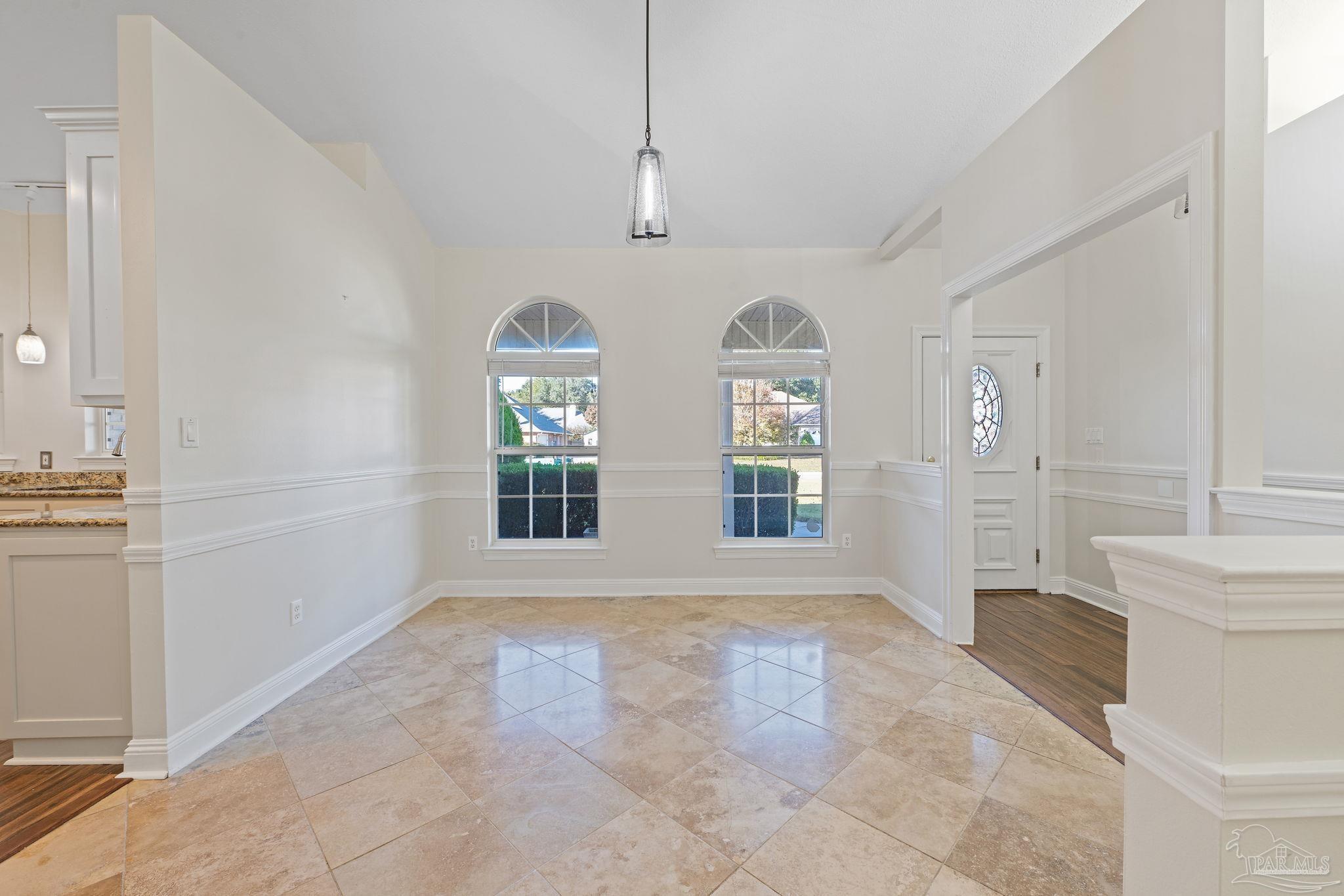 4149 Chartwell Street Pace, FL 32571 - Photo 9 of 49 a view of livingroom with kitchen