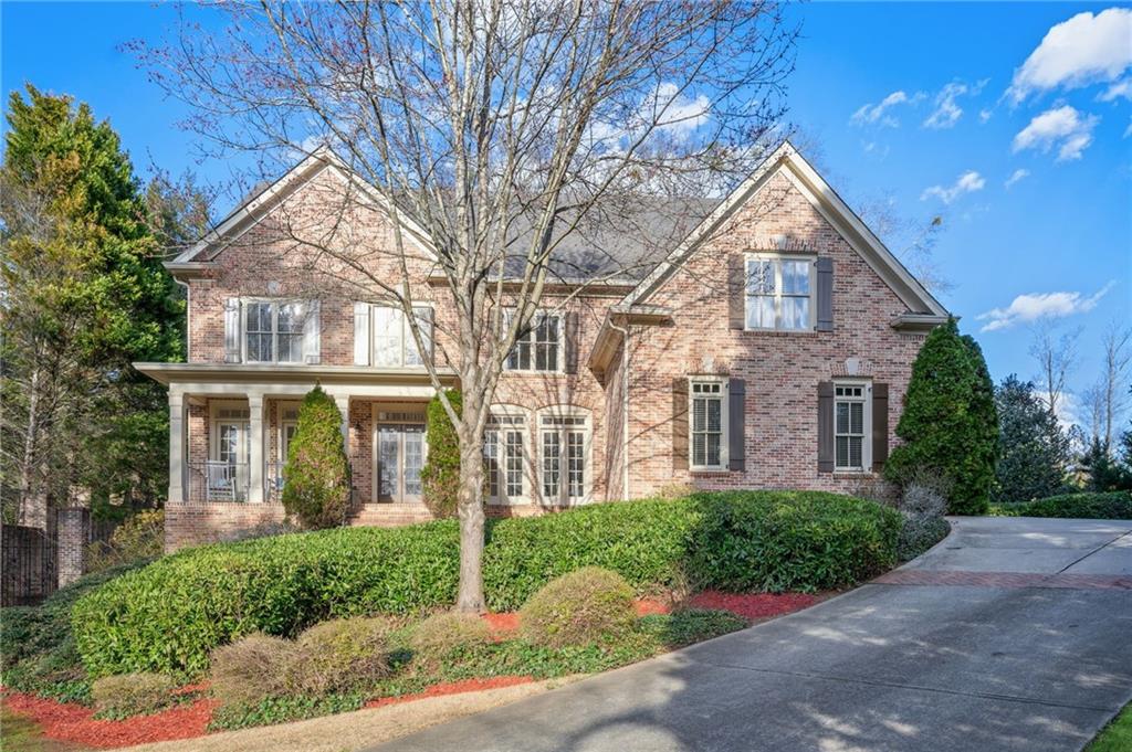 644 Windsor Parkway Atlanta, GA 30342 - Photo 1 of 1 a front view of a house with garden