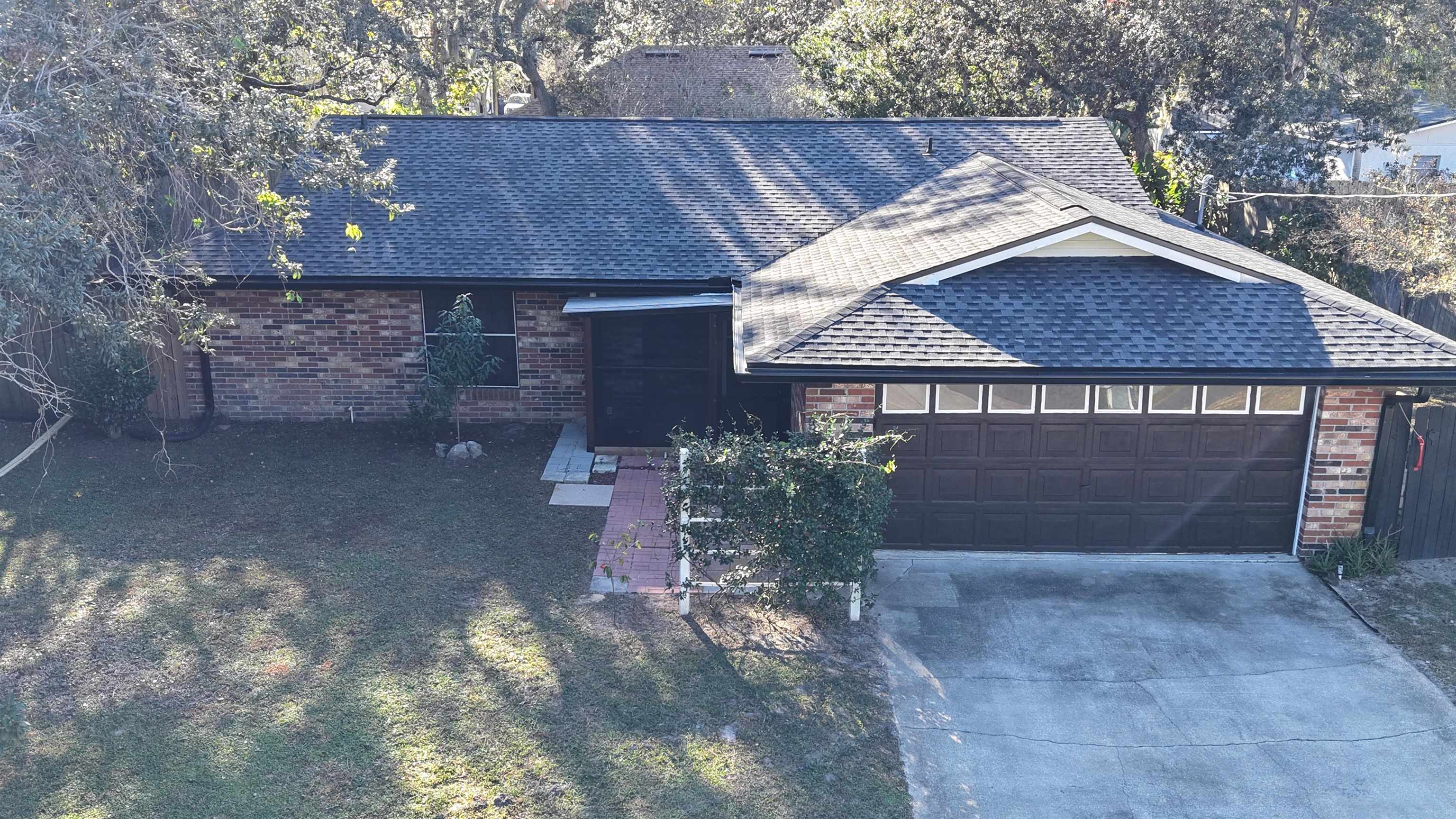 222 Jasmine Road St. Augustine, FL 32086 - Photo 1 of 30 a front view of a house with a garden