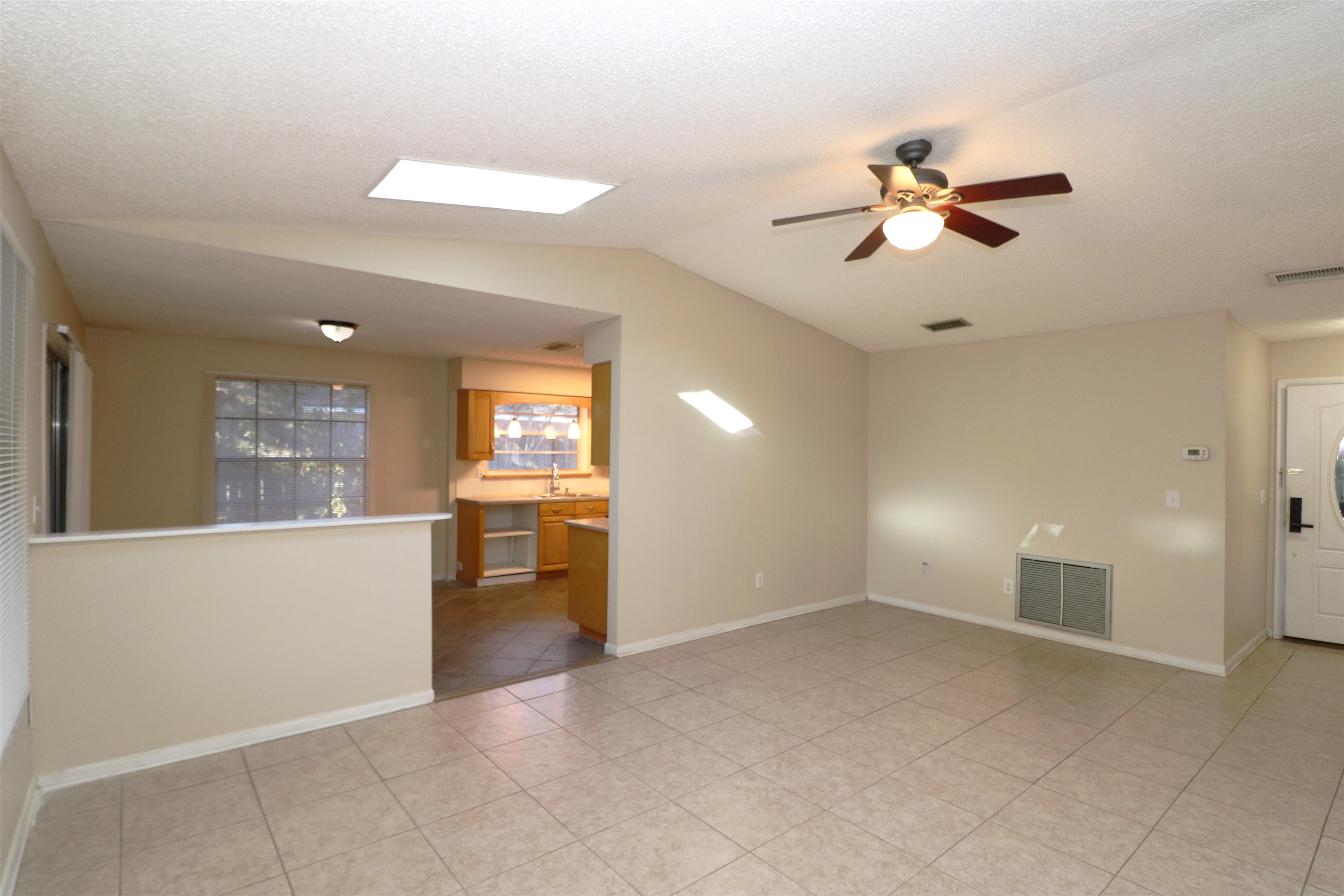 222 Jasmine Road St. Augustine, FL 32086 - Photo 3 of 30 a view of a livingroom with a fireplace