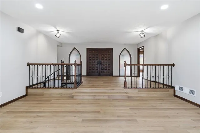 a kitchen with stainless steel appliances a stove a sink dishwasher and cabinets