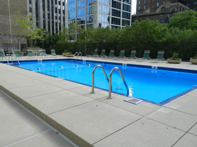 1310 North Ritchie Court, Unit 11C Chicago, IL 60610 - Photo 17 of 21 a view of a swimming pool with a patio