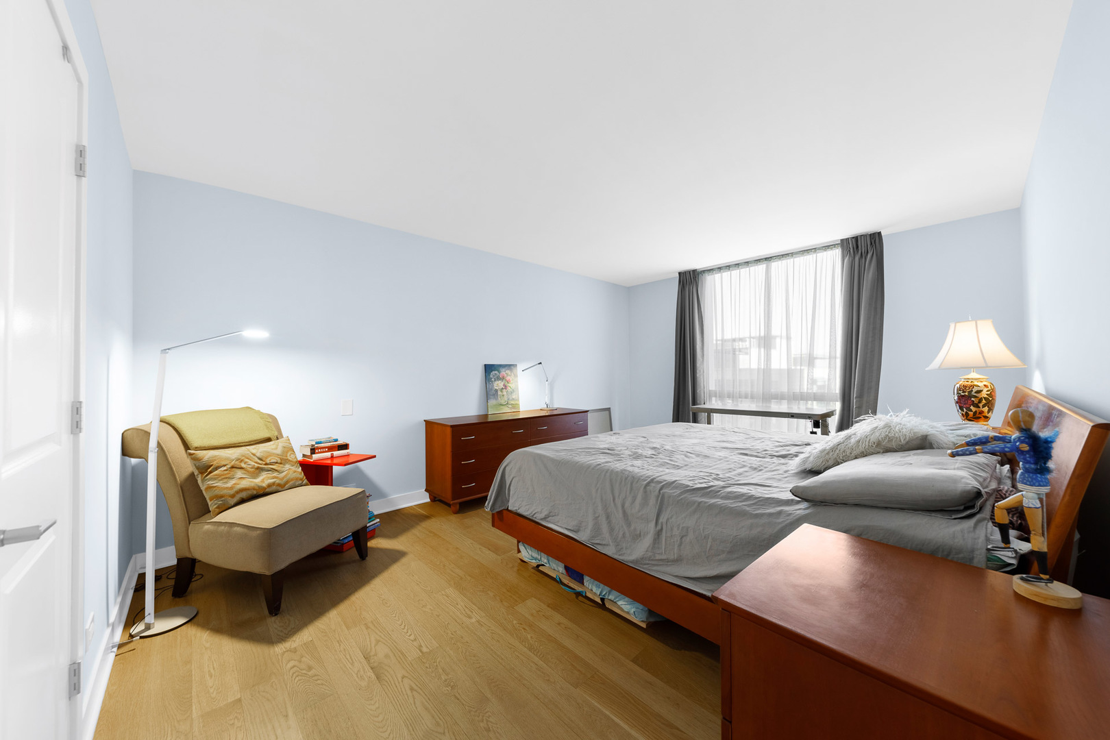 1310 North Ritchie Court, Unit 11C Chicago, IL 60610 - Photo 9 of 21 a bedroom with a bed and window