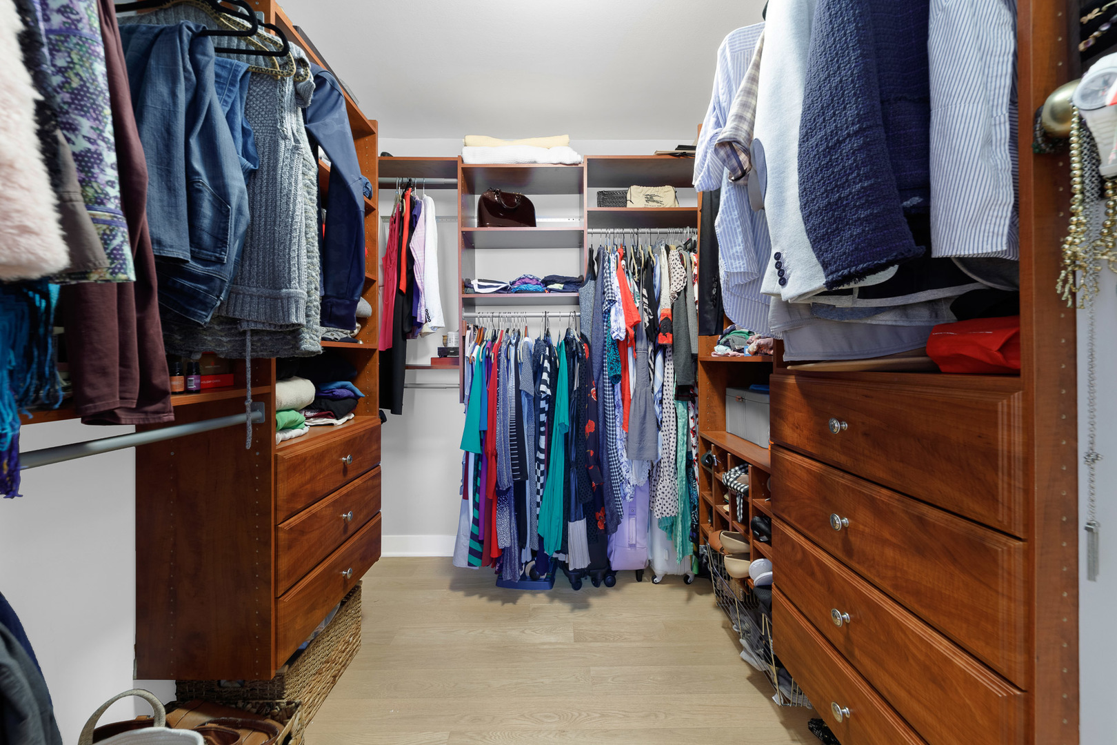 1310 North Ritchie Court, Unit 11C Chicago, IL 60610 - Photo 10 of 21 a view of walk in closet with clothes